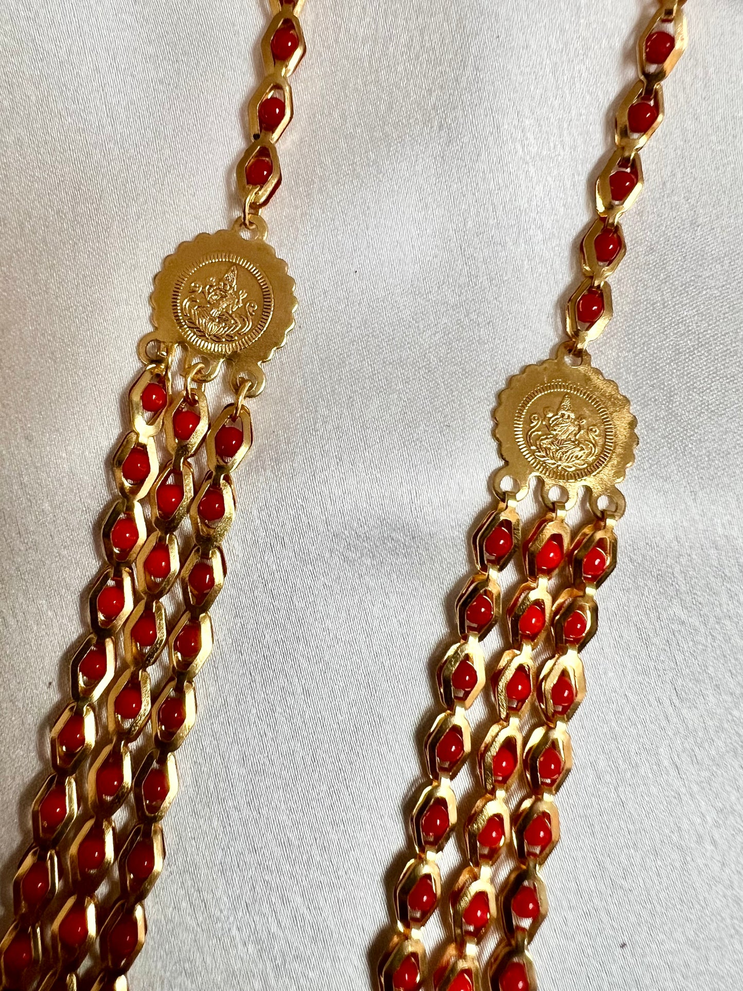 HASINI - Long golden chain with red balls all along N3217