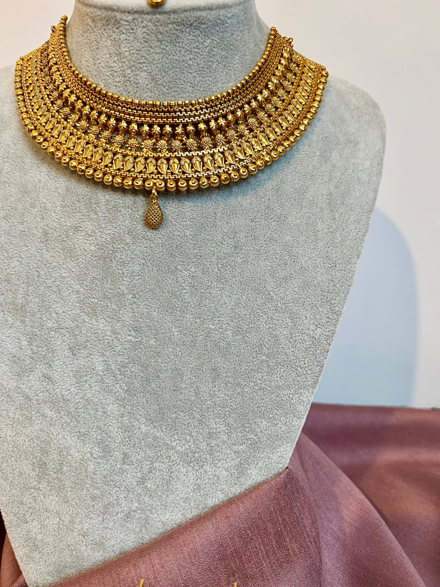 VAISHI - Bridal high neck gold plated necklace with earrings and tikka N3180