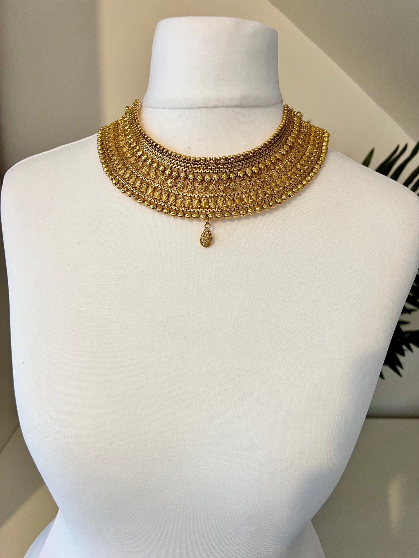 VAISHI - Bridal high neck gold plated necklace with earrings and tikka N3180