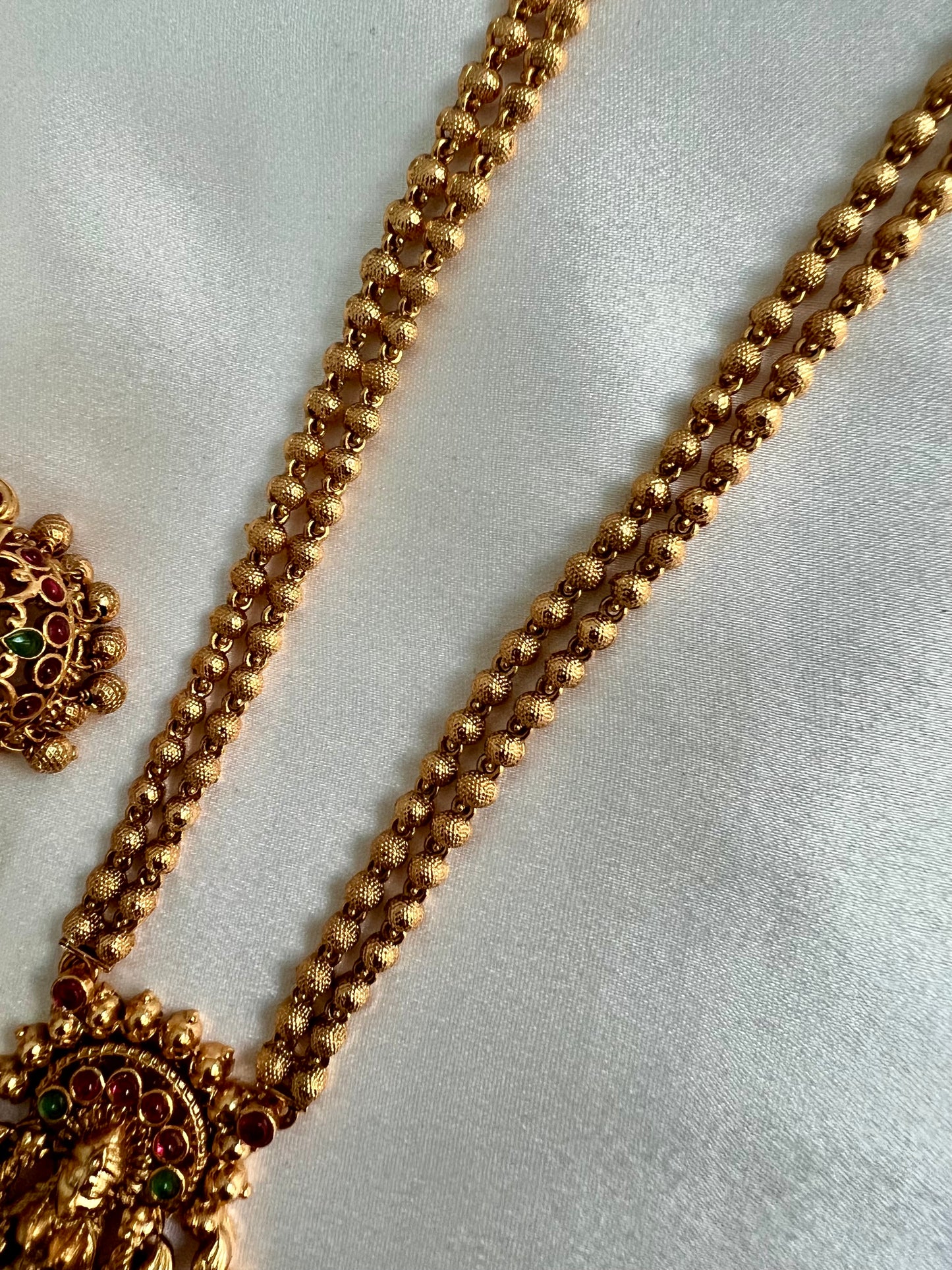 LAKSHMI - Antique temple long matte gold plated jewellery in rubygreen with matching jhumkas N3025