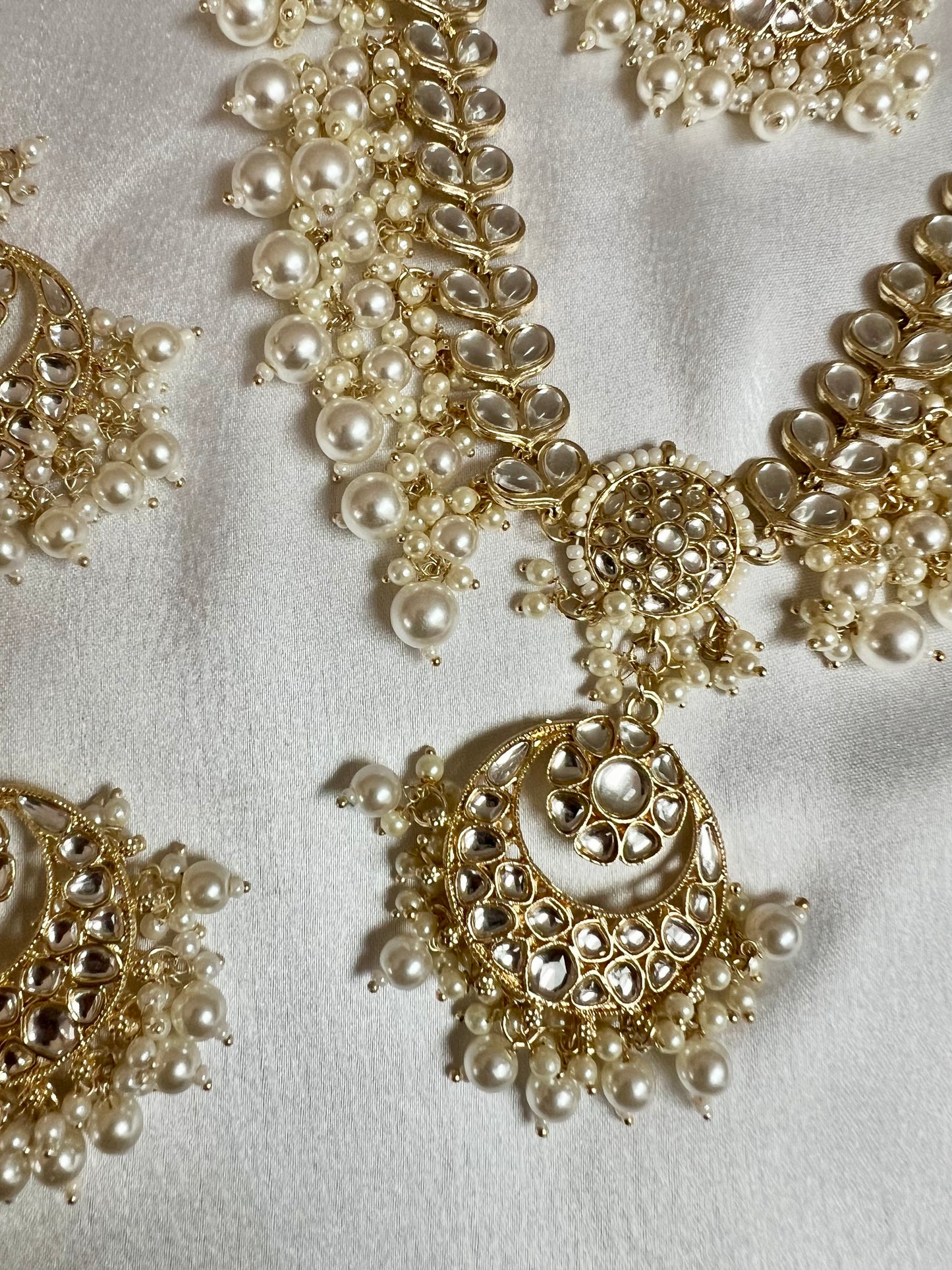 KANITHA- long pearl necklace with matching earrings and tikka N3200