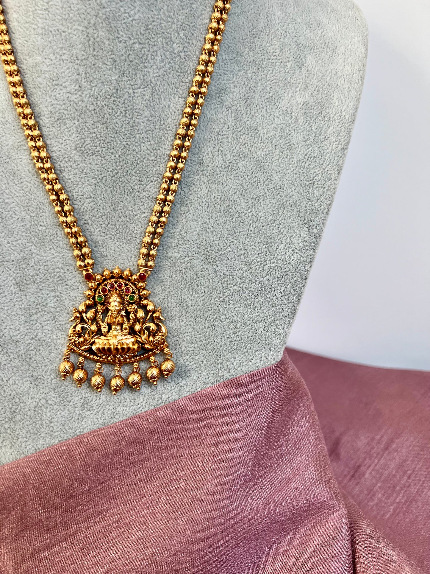 LAKSHMI - Antique temple long matte gold plated jewellery in rubygreen with matching jhumkas N3025