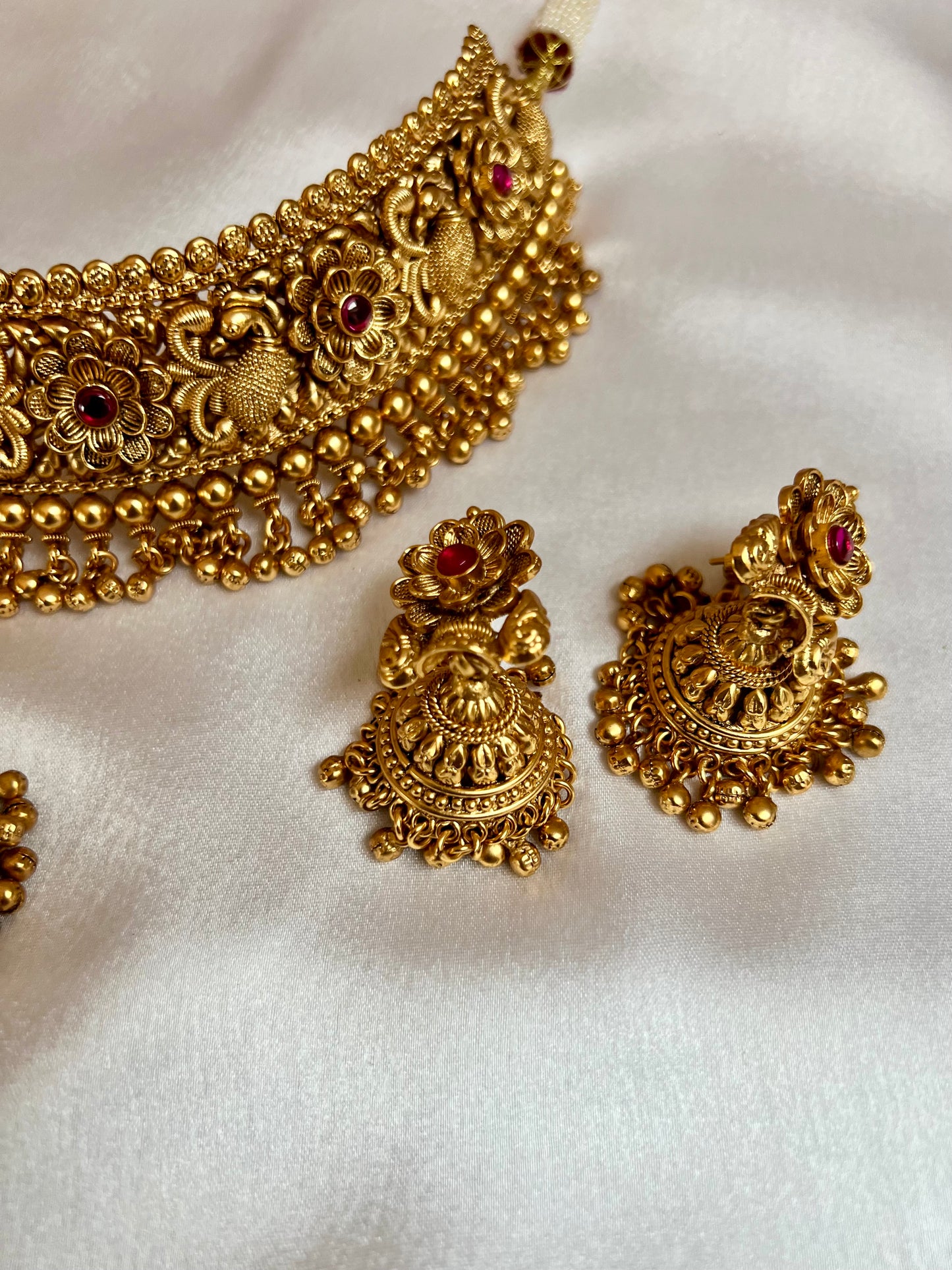 VINO- Antique high neck golden necklace with golden pearls and ruby stones, tikka and jhumkas N3181