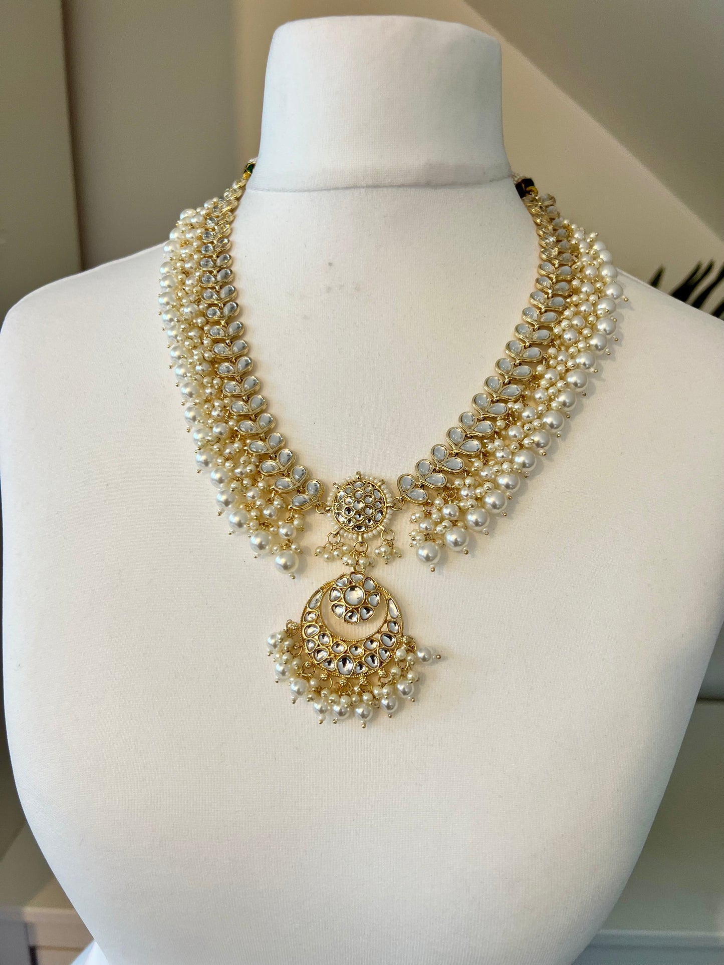 KANITHA- long pearl necklace with matching earrings and tikka N3200