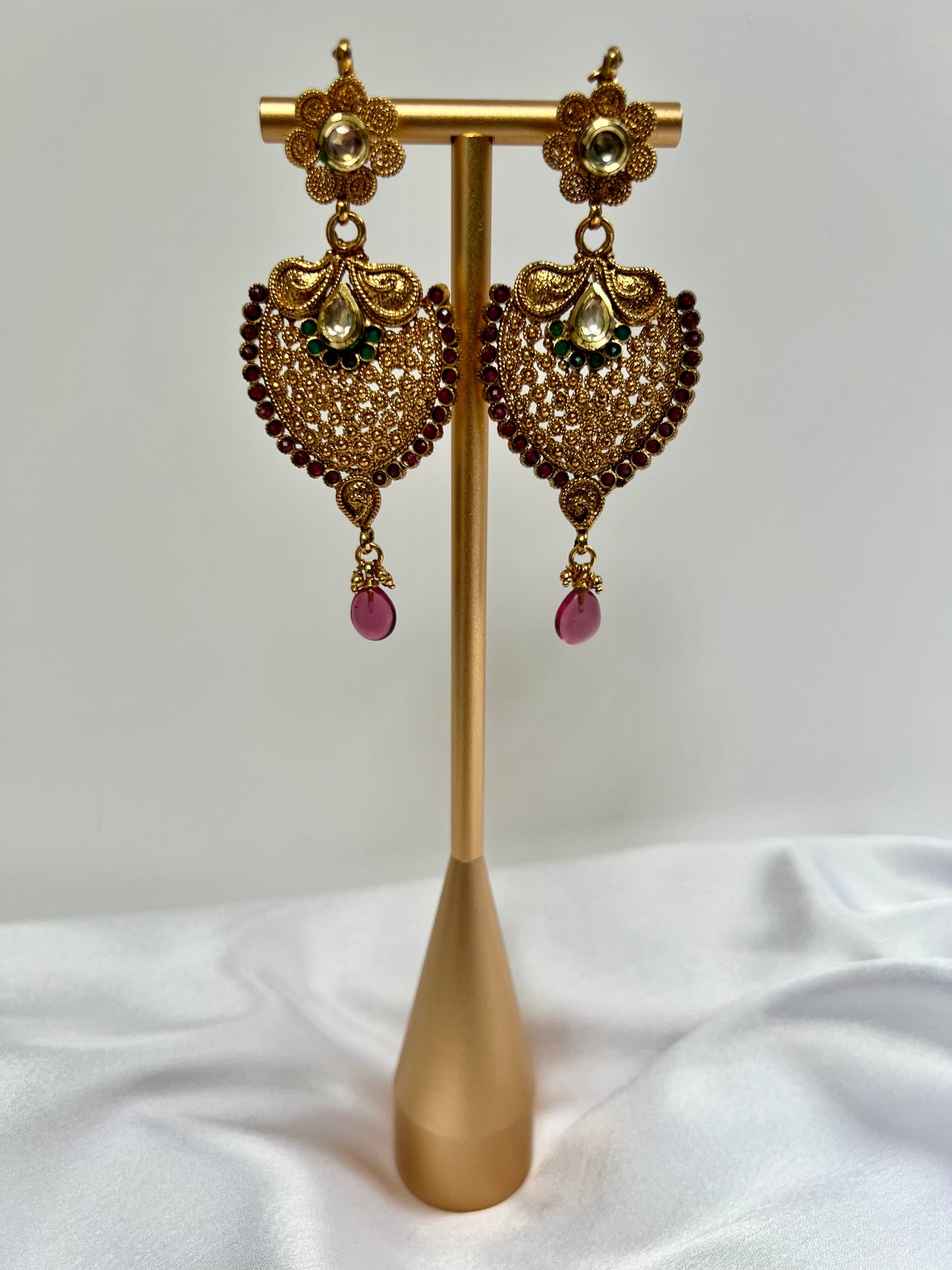 Long flat golden earrings with purple and green stones E3065