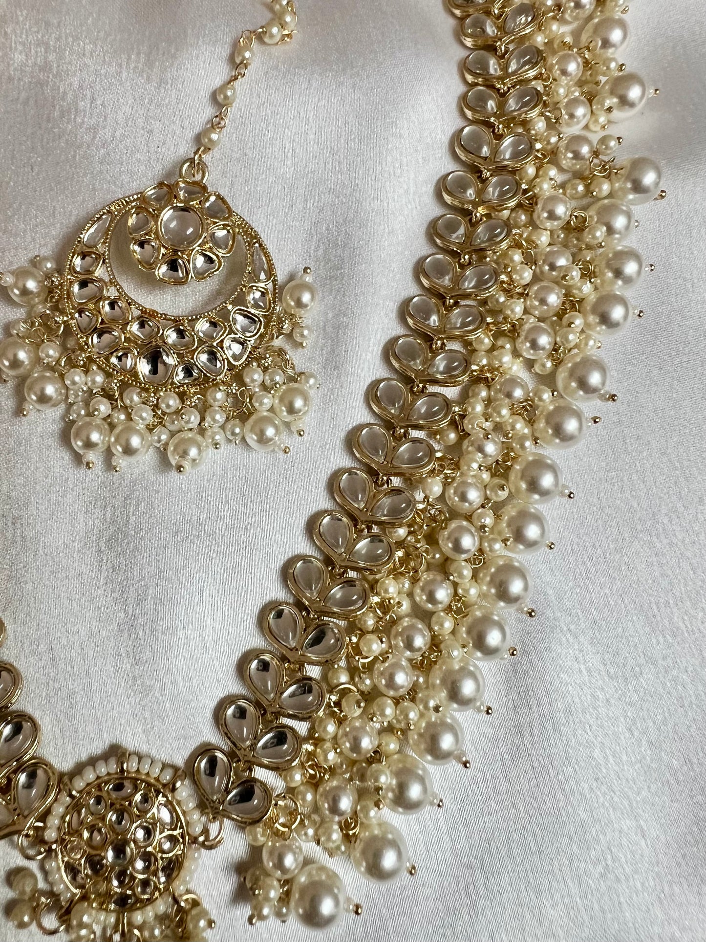 KANITHA- long pearl necklace with matching earrings and tikka N3200