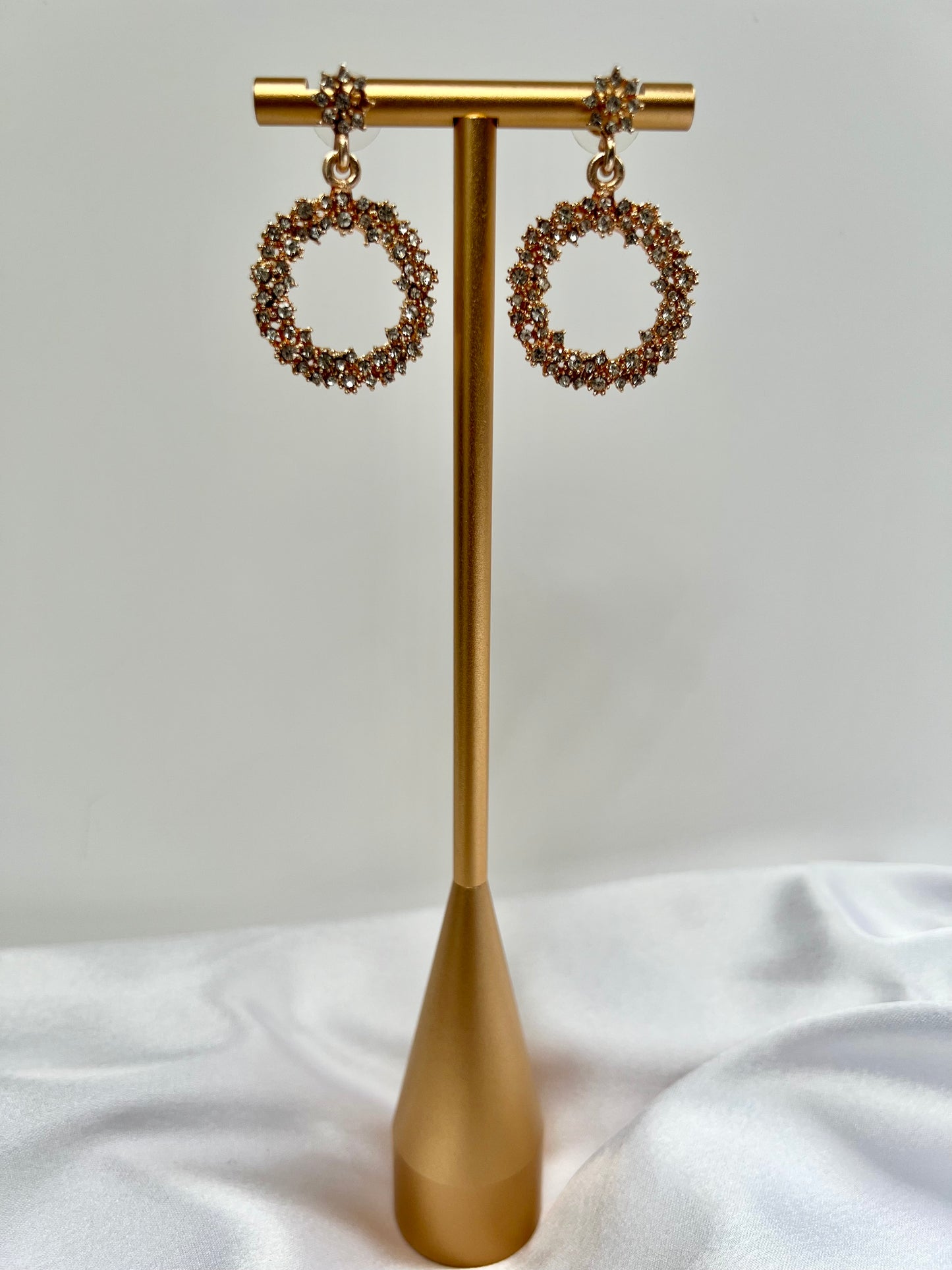 Small round Cz white stoned golden earrings E3068