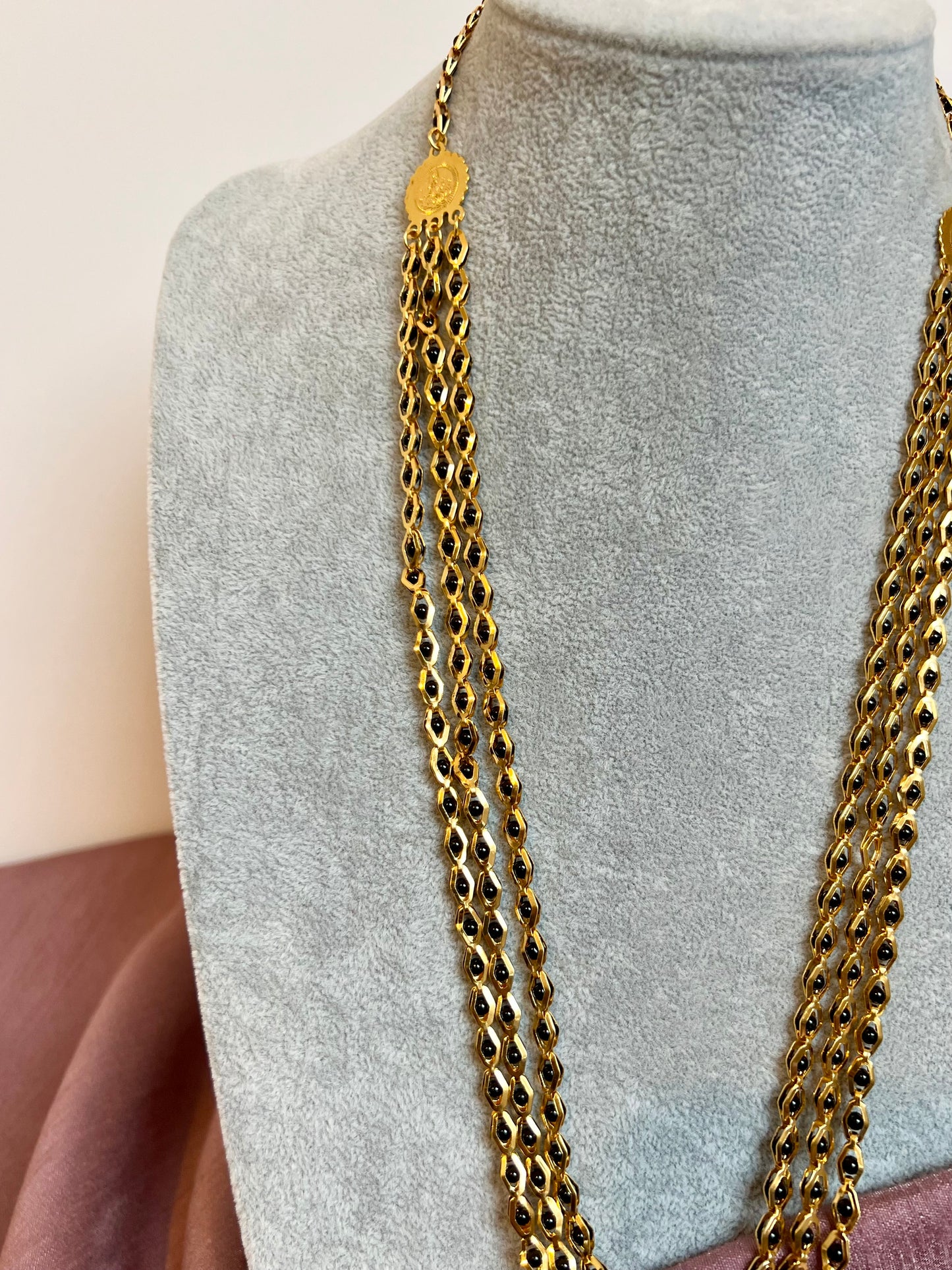 SHAMINI - long golden chain with black balls all along N3220