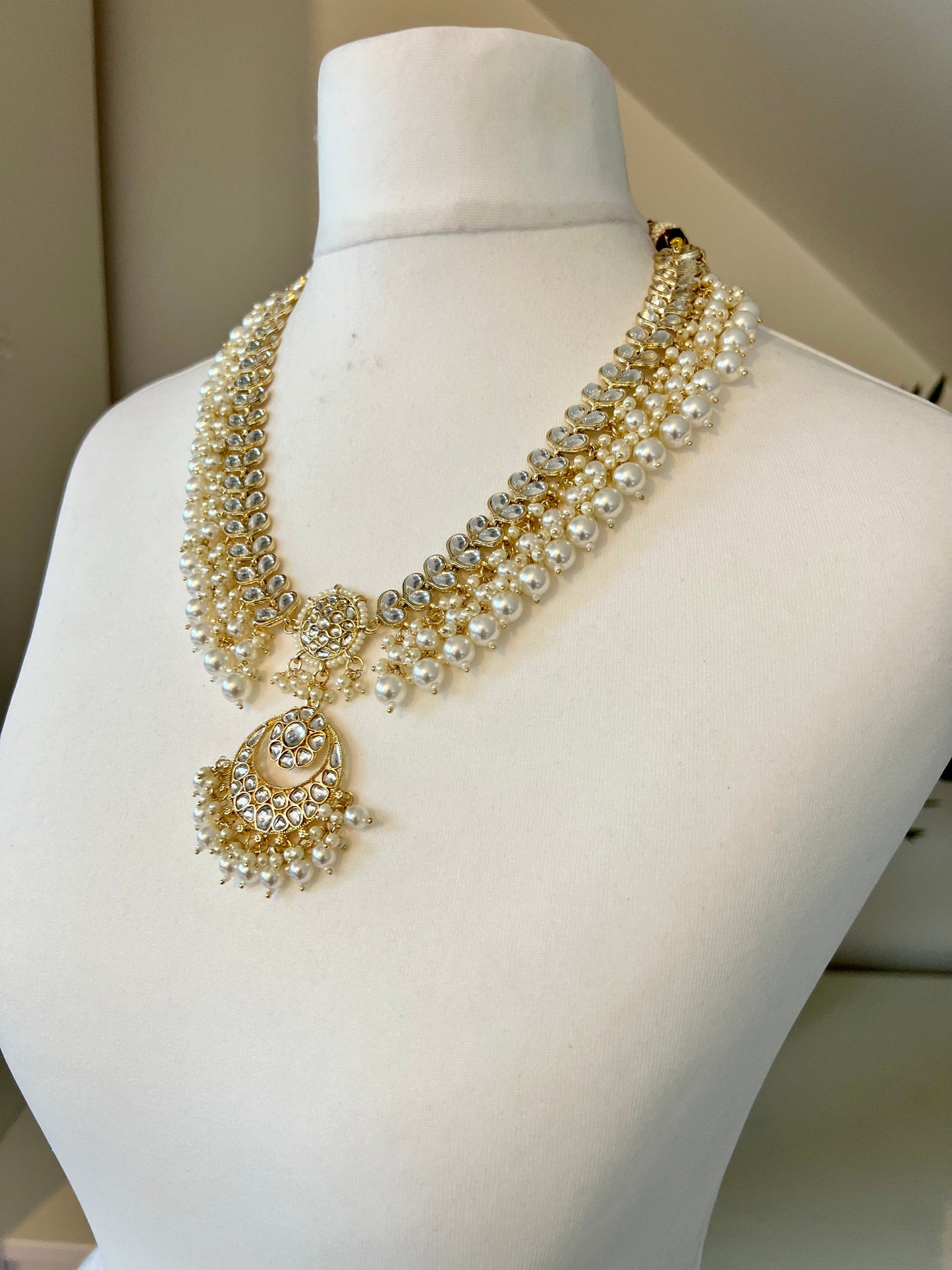 KANITHA- long pearl necklace with matching earrings and tikka N3200