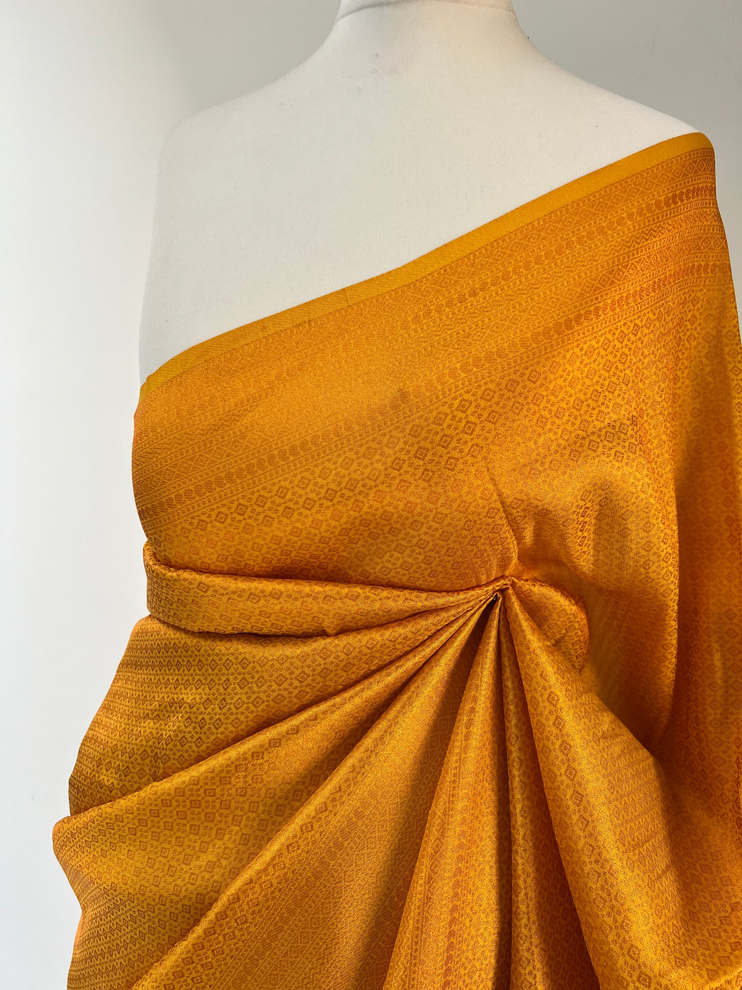 Plain yellow kubera silk saree, comes with tassels and blouse piece attached S3011