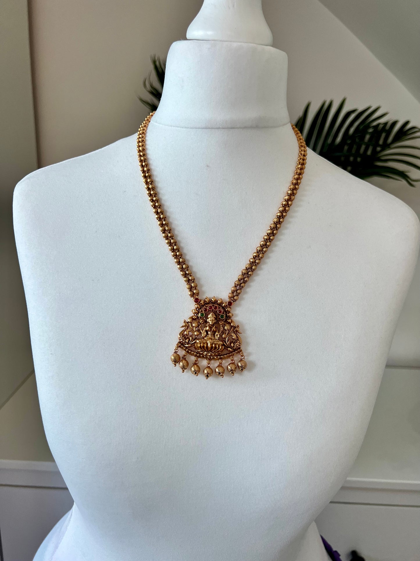 LAKSHMI - Antique temple long matte gold plated jewellery in rubygreen with matching jhumkas N3025