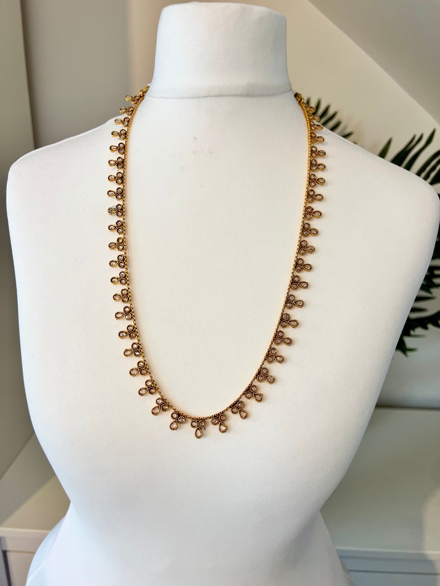 THANISHA - long kundan stone golden necklace with flat earrings N3211