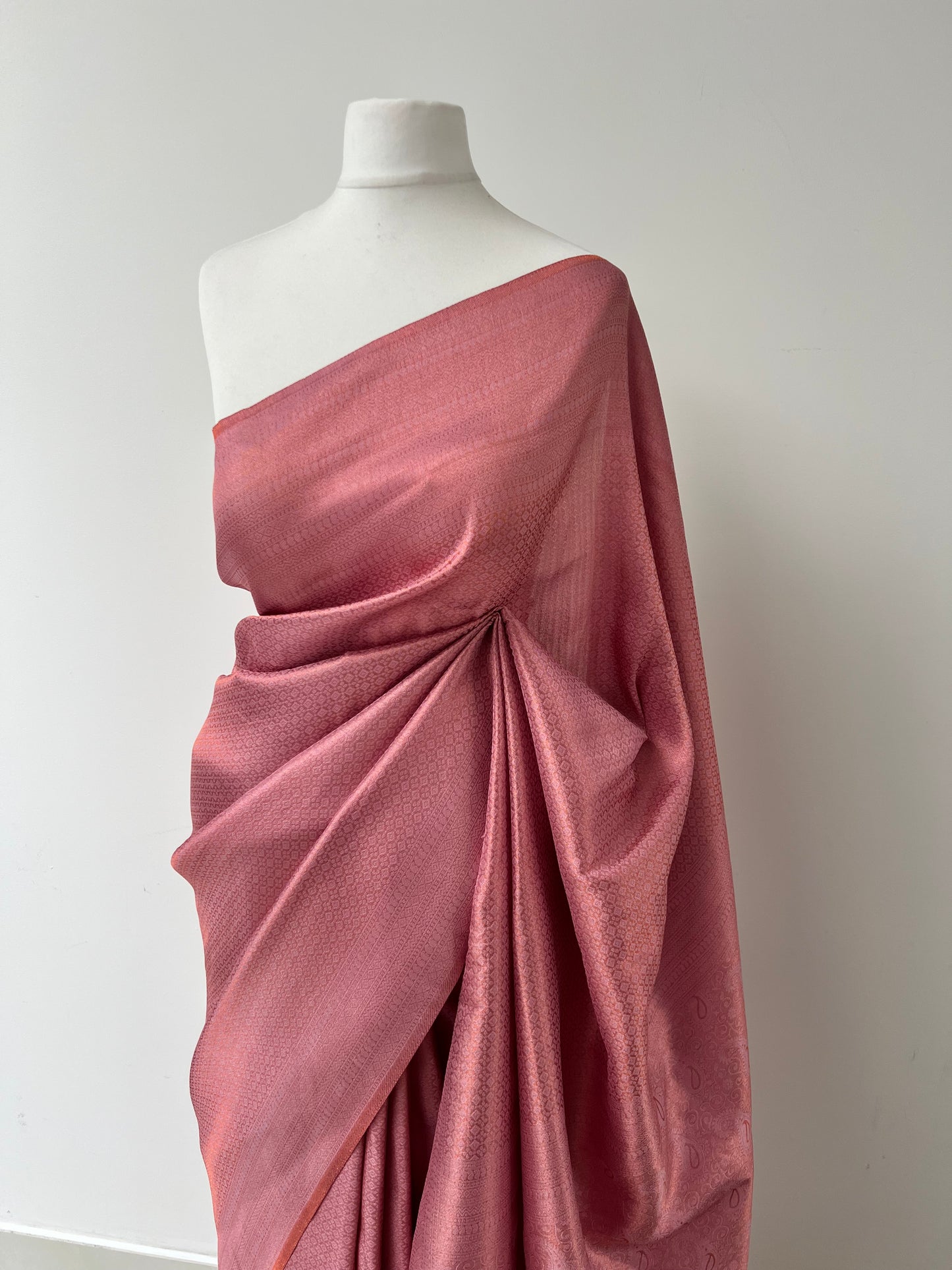 Soft pink kubera silk saree comes with tassels and blouse piece attached S3009