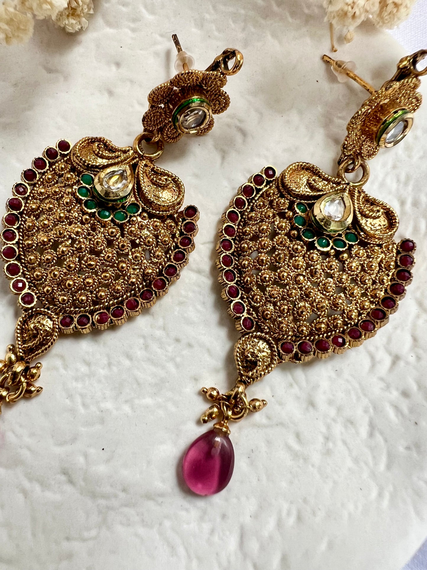 Long flat golden earrings with purple and green stones E3065