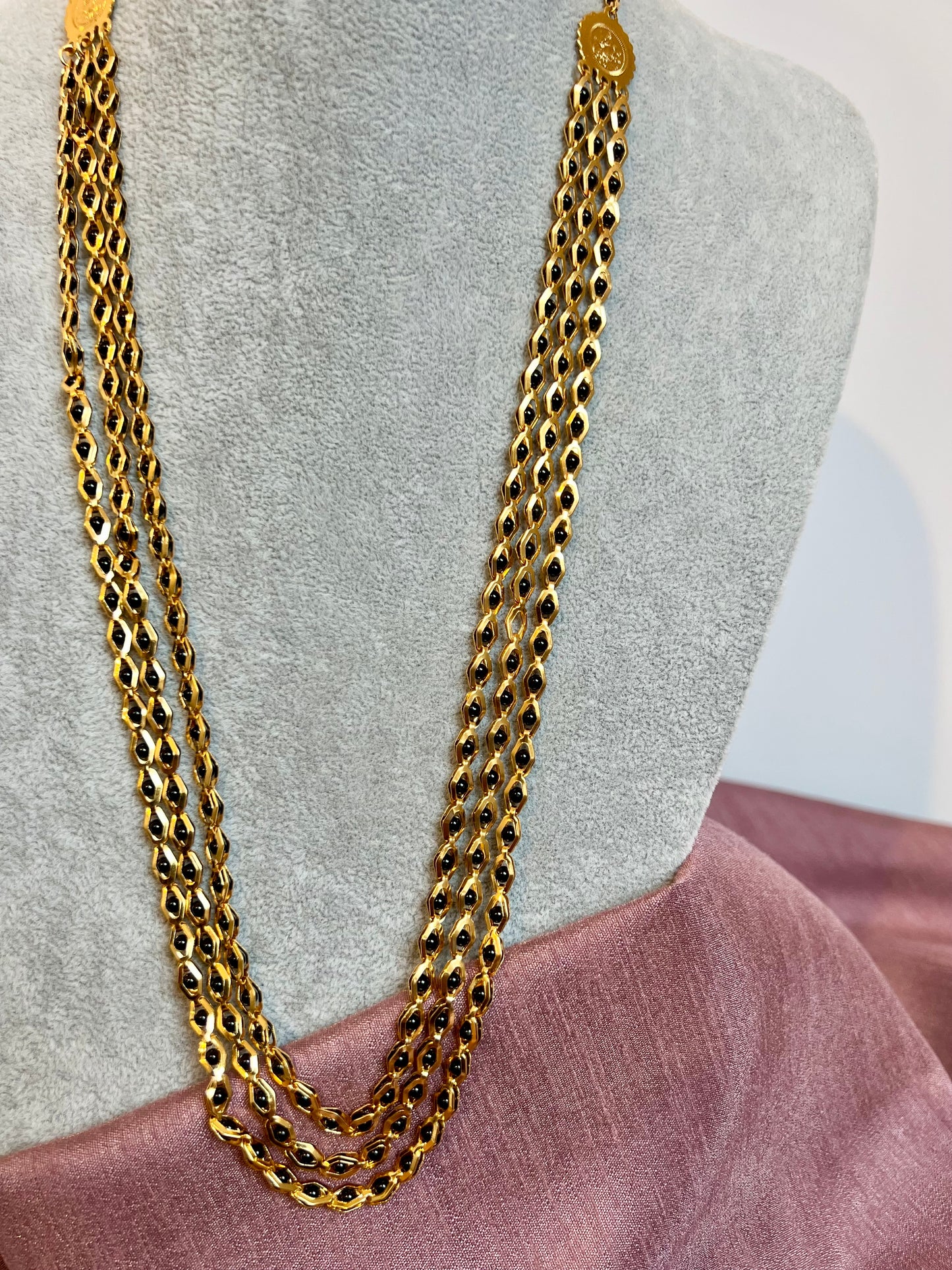 SHAMINI - long golden chain with black balls all along N3220