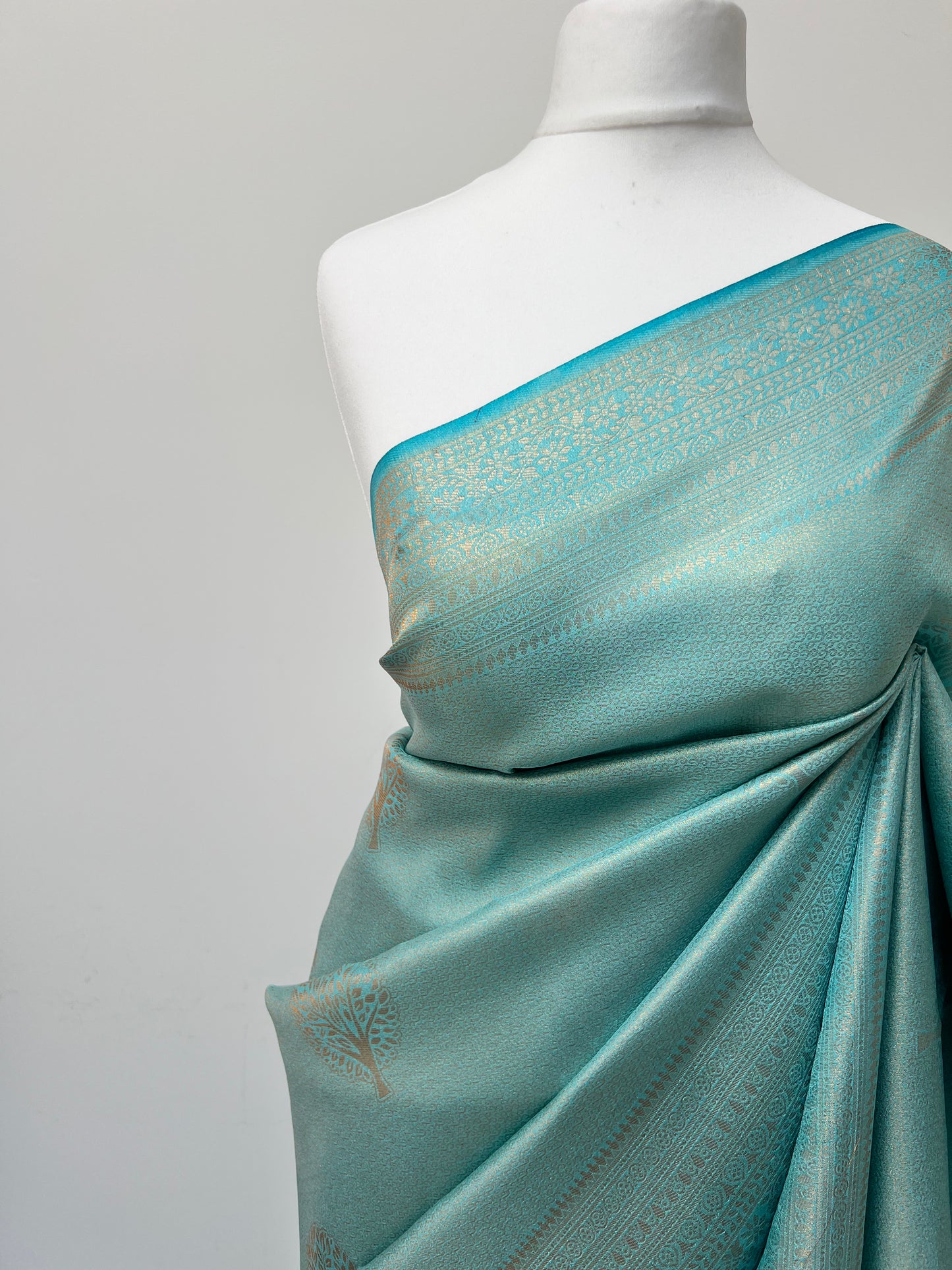 Ocean blue kubera silk saree with matching blouse and tassels attached S3006