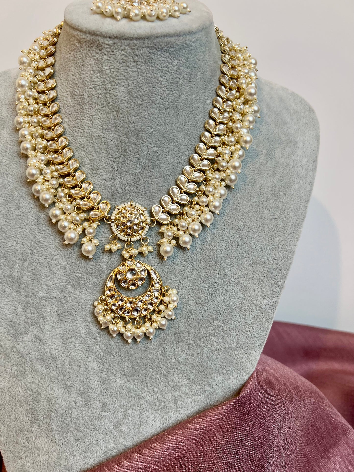KANITHA- long pearl necklace with matching earrings and tikka N3200