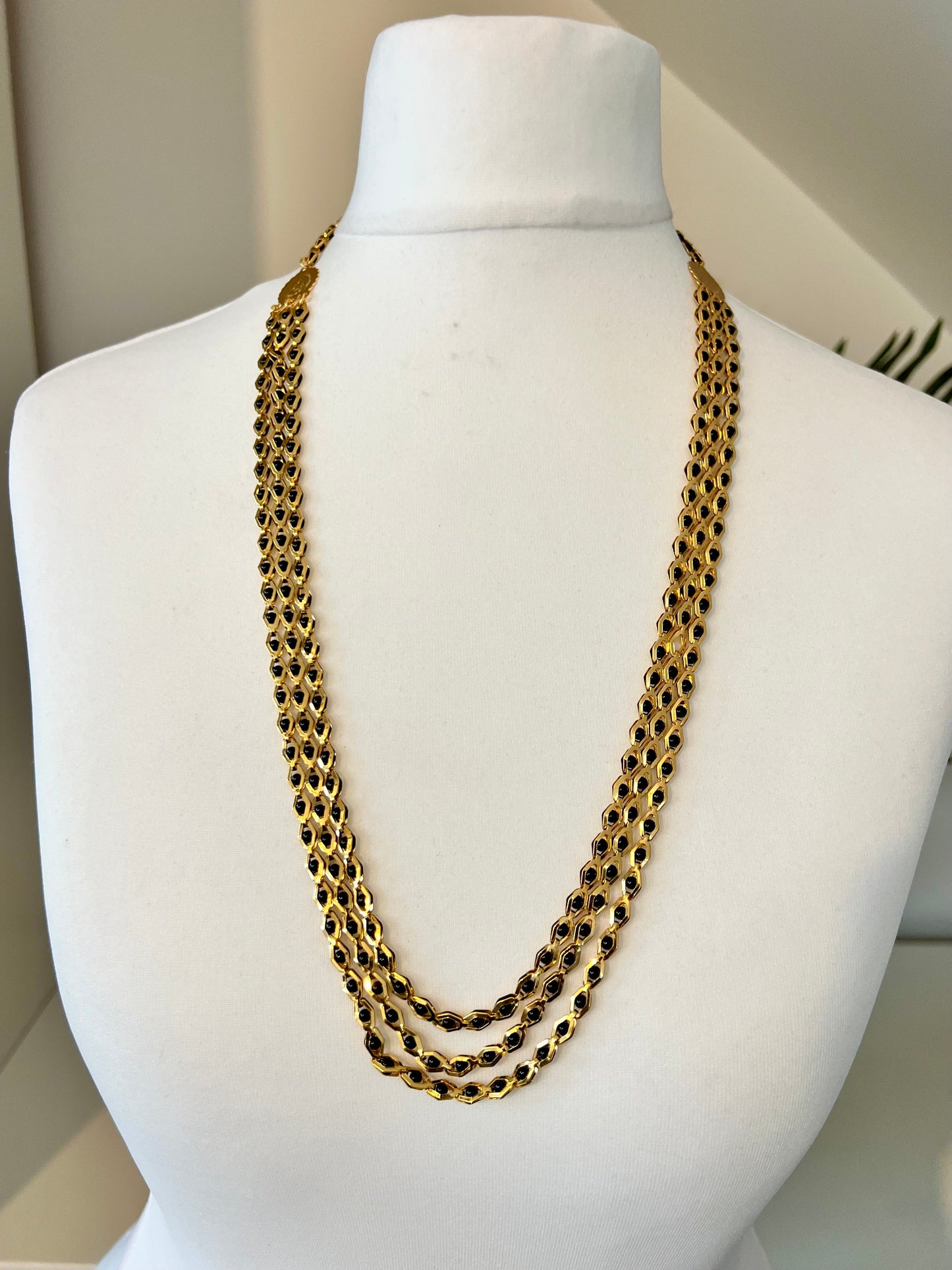 SHAMINI - long golden chain with black balls all along N3220