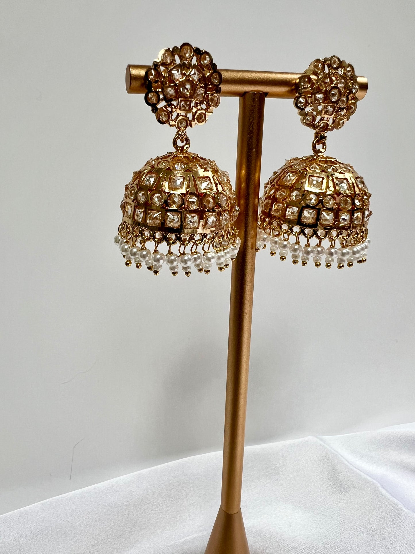 Gold plated white stone pearl jhumka earrings E3023