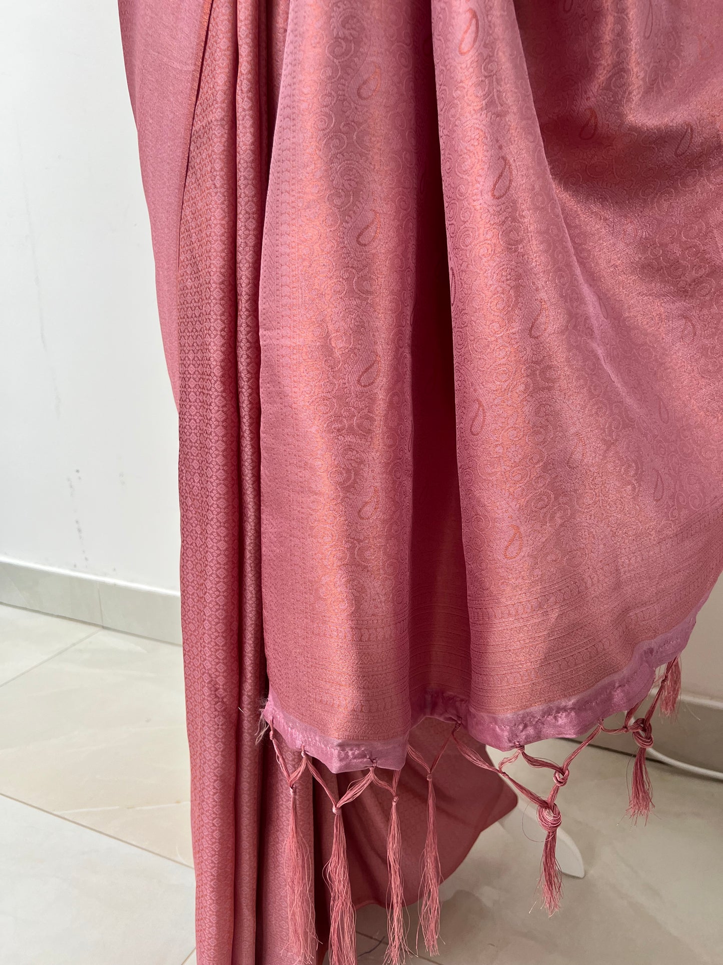 Soft pink kubera silk saree comes with tassels and blouse piece attached S3009