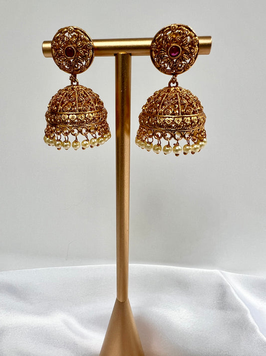 Gold plated jhumka earrings with pearls and ruby stone E3022