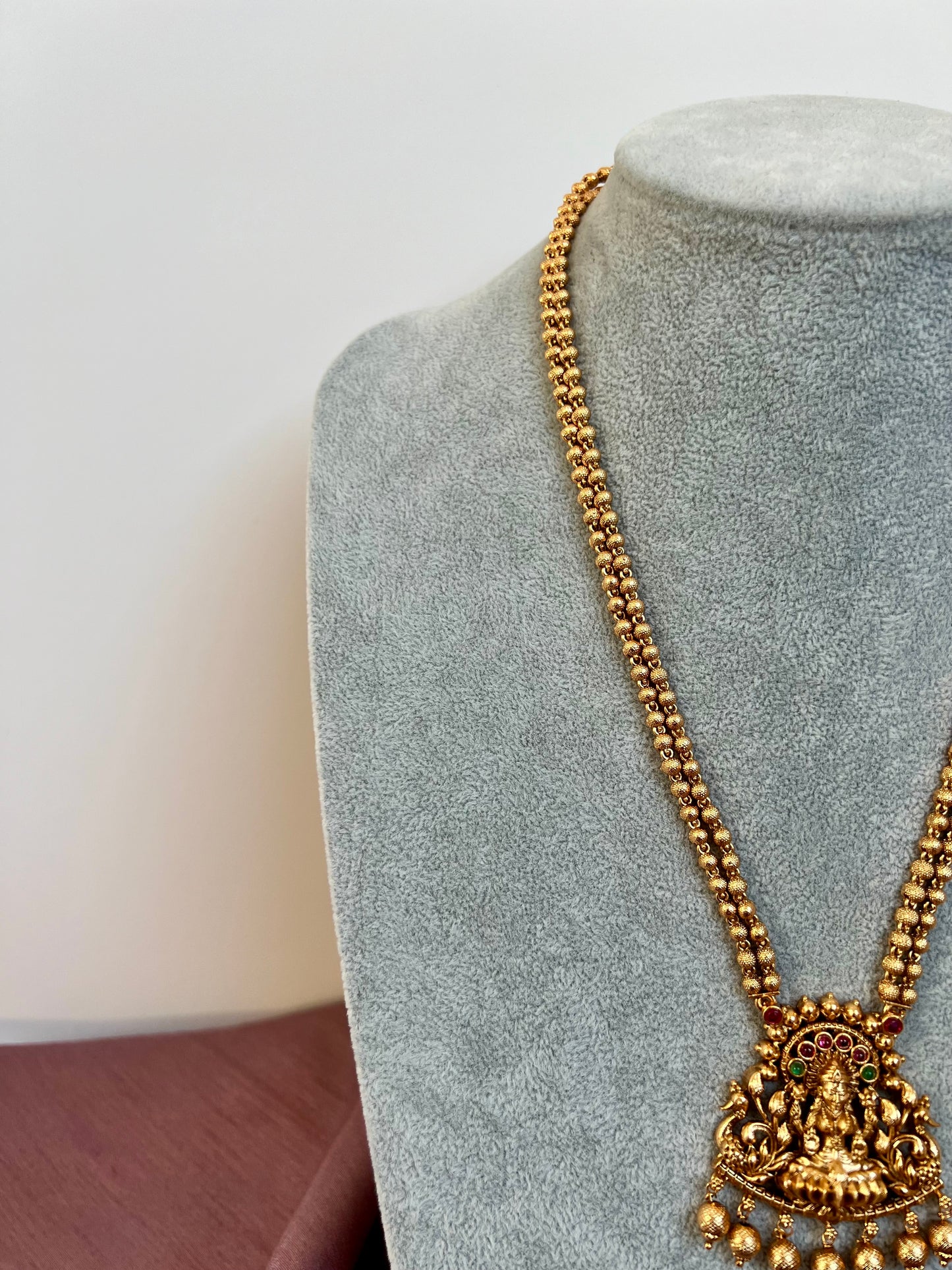 LAKSHMI - Antique temple long matte gold plated jewellery in rubygreen with matching jhumkas N3025