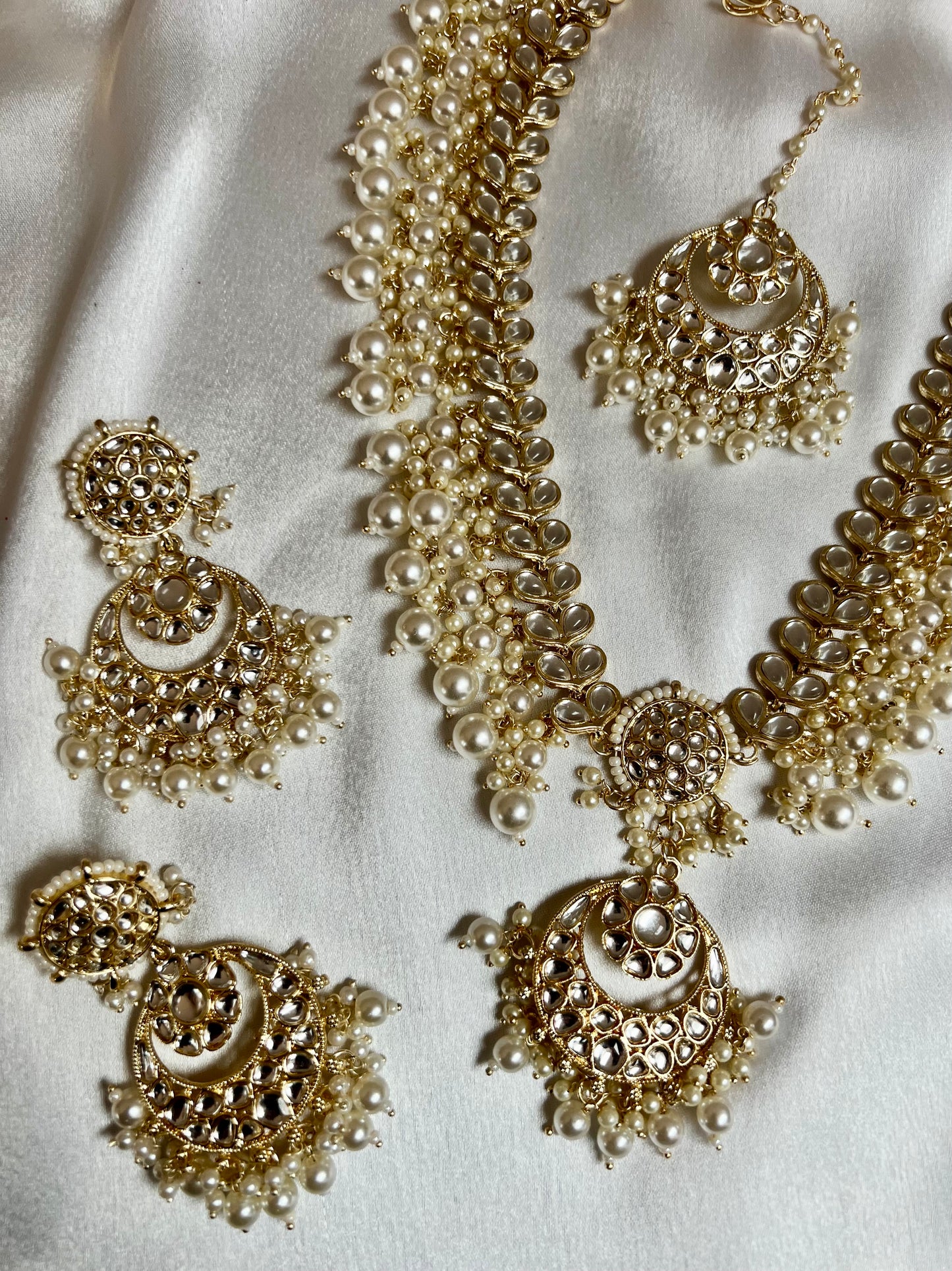 KANITHA- long pearl necklace with matching earrings and tikka N3200