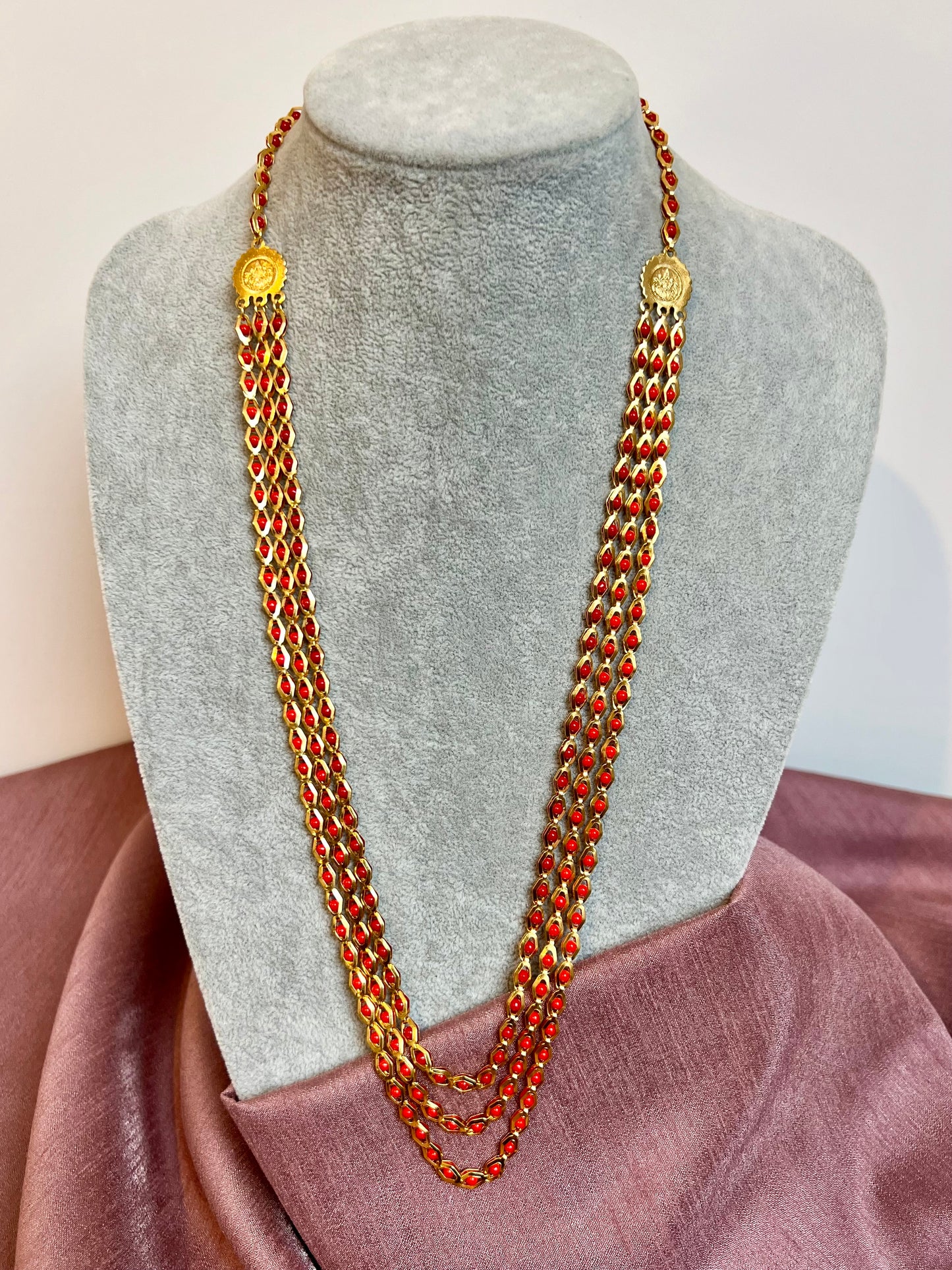 HASINI - Long golden chain with red balls all along N3217