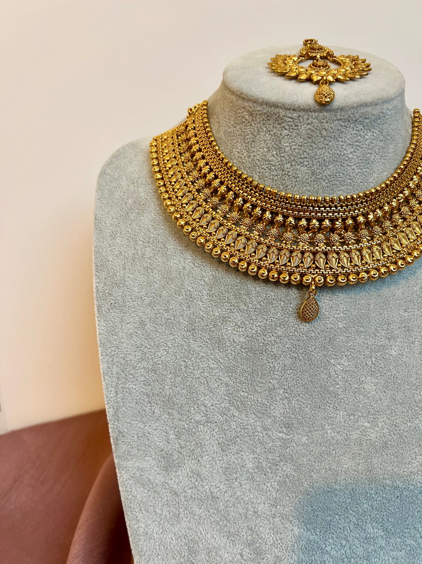 VAISHI - Bridal high neck gold plated necklace with earrings and tikka N3180