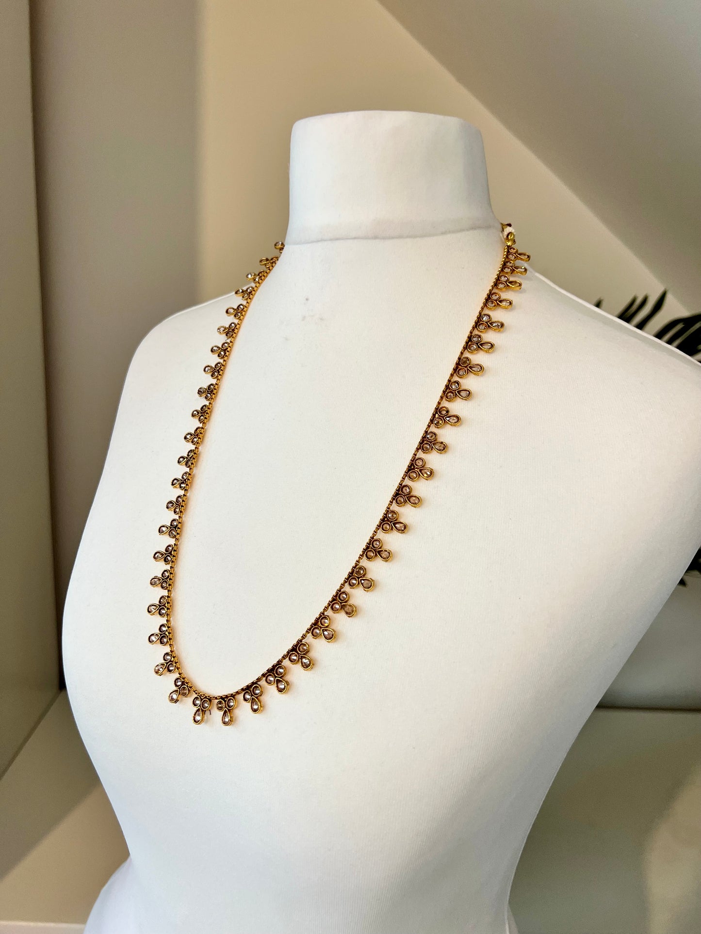 THANISHA - long kundan stone golden necklace with flat earrings N3211