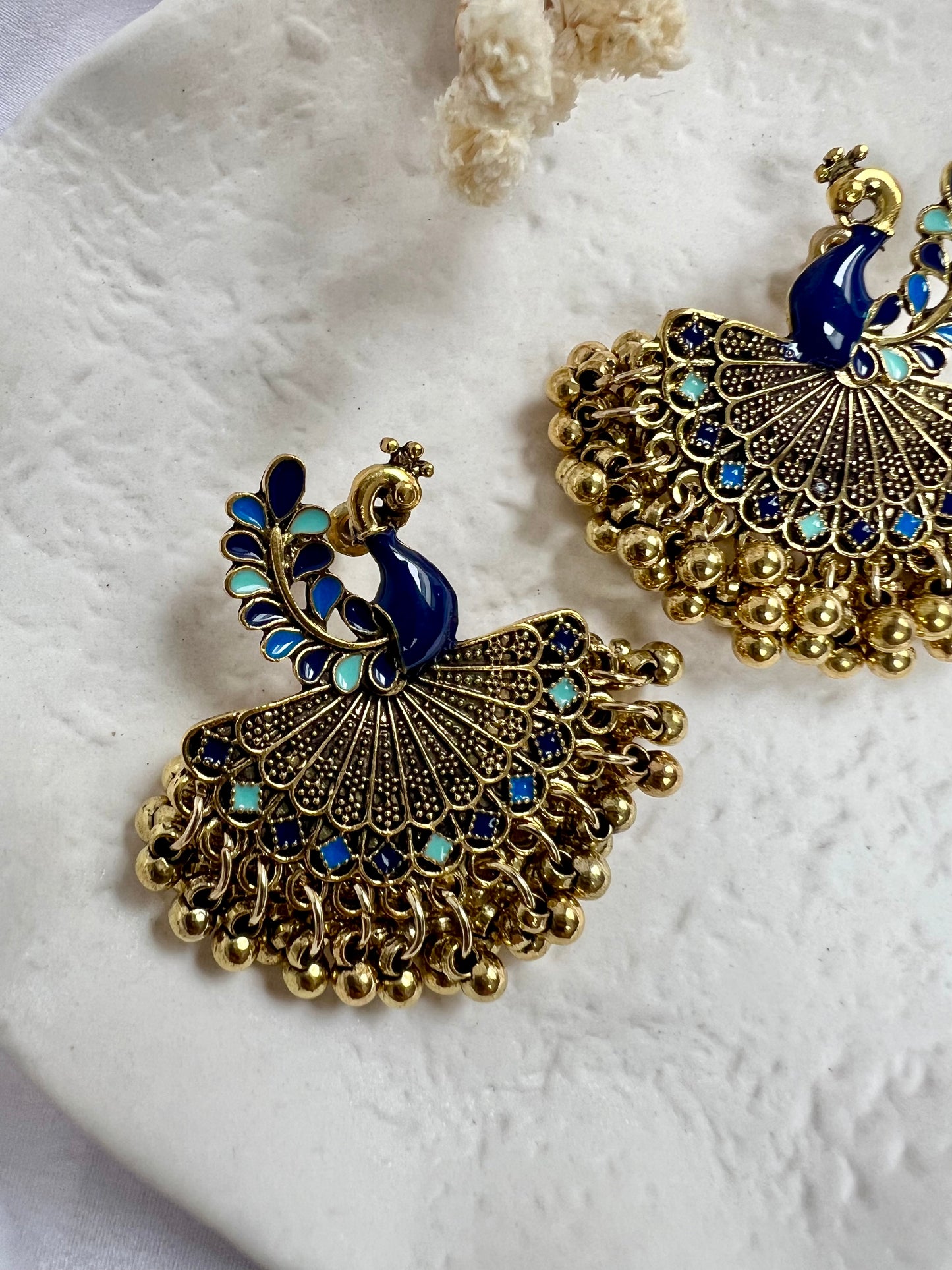 Blue painted antique gold peacock shaped earrings E3053