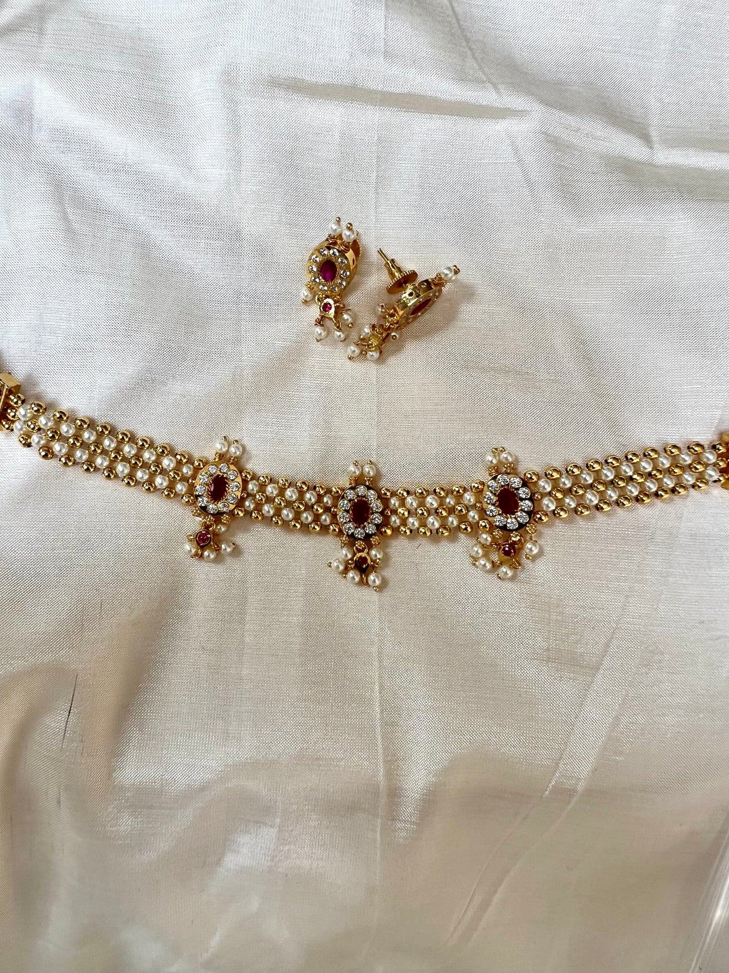 KANIMOZHI- Impon pearl choker in ruby and white with matching earrings N3298