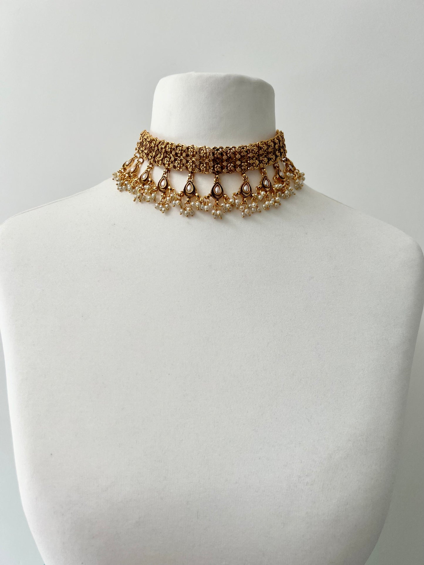 THIVIJA- Gold plated golden band necklace with dangling pearl gems N3297