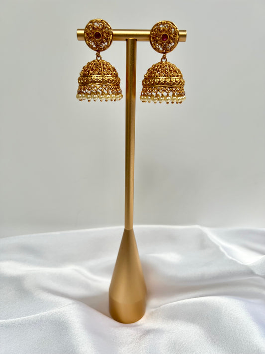 Gold plated jhumka earrings with pearls and ruby stone E3022