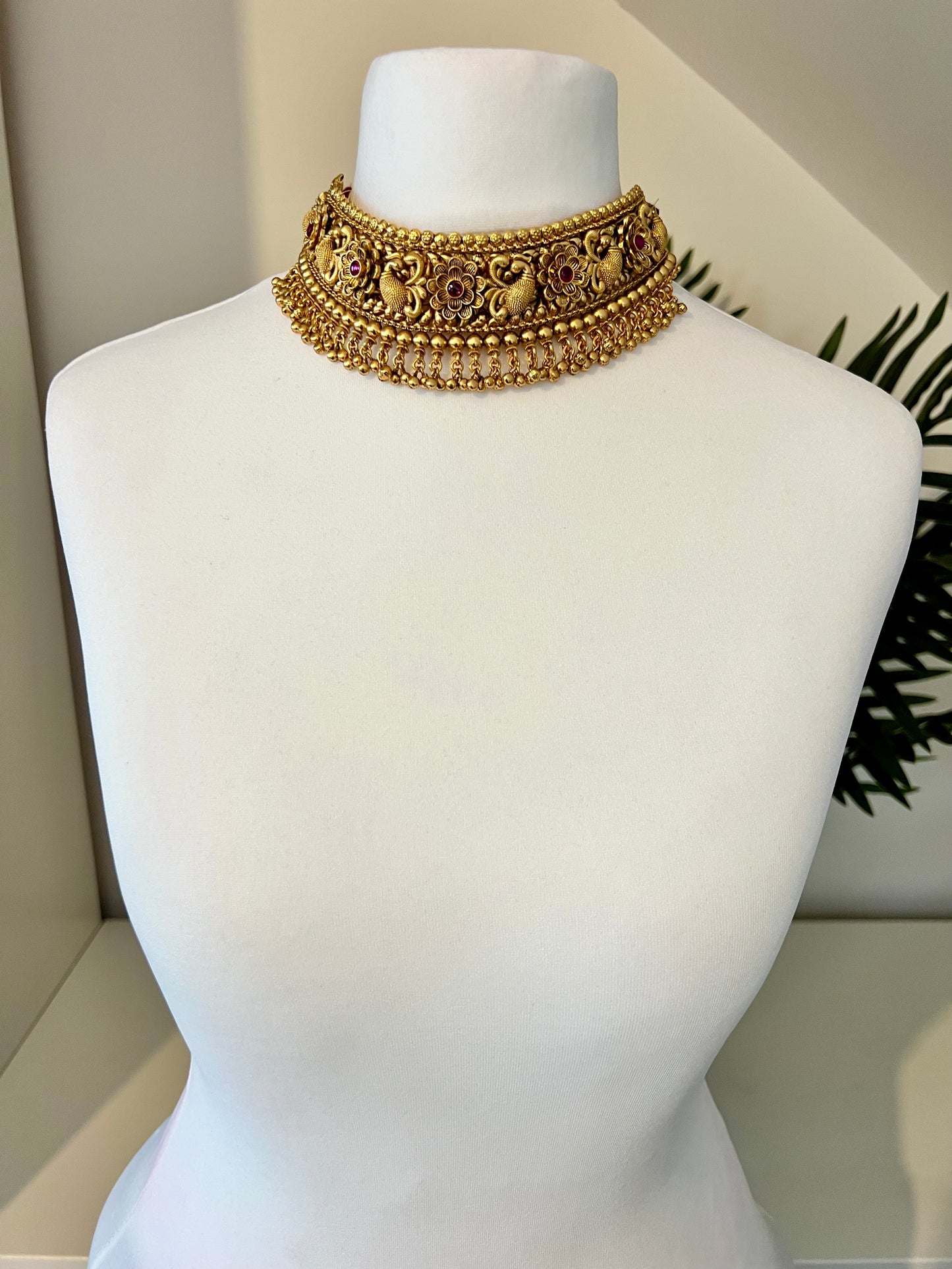VINO- Antique high neck golden necklace with golden pearls and ruby stones, tikka and jhumkas N3181