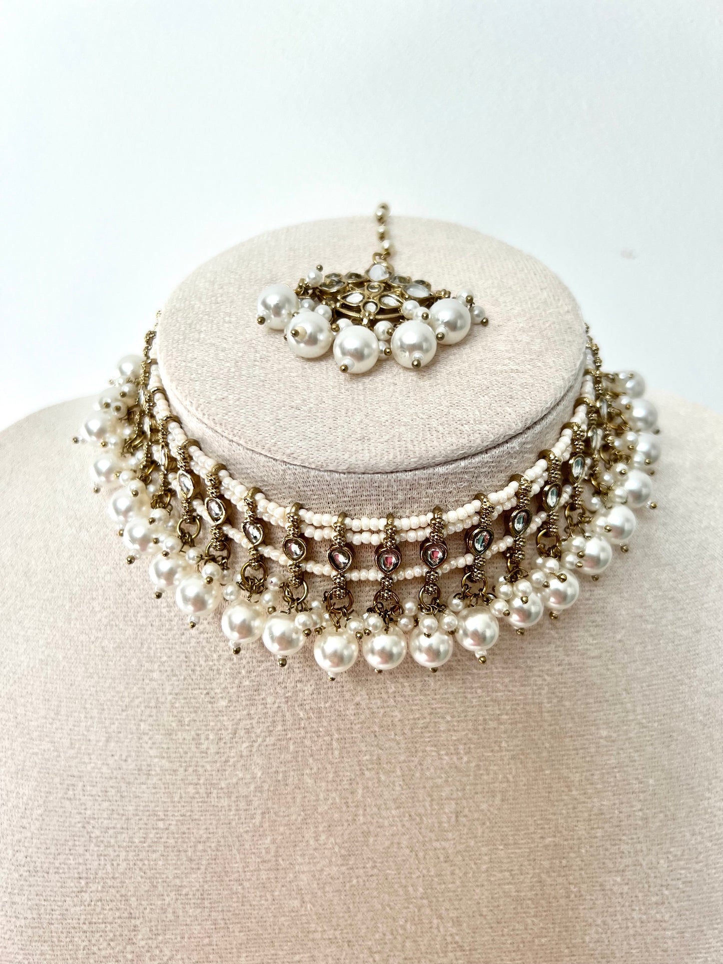 SARELA - Mehndi plated white pearl stoned high band necklace with matching jhumkas and tikka N3294