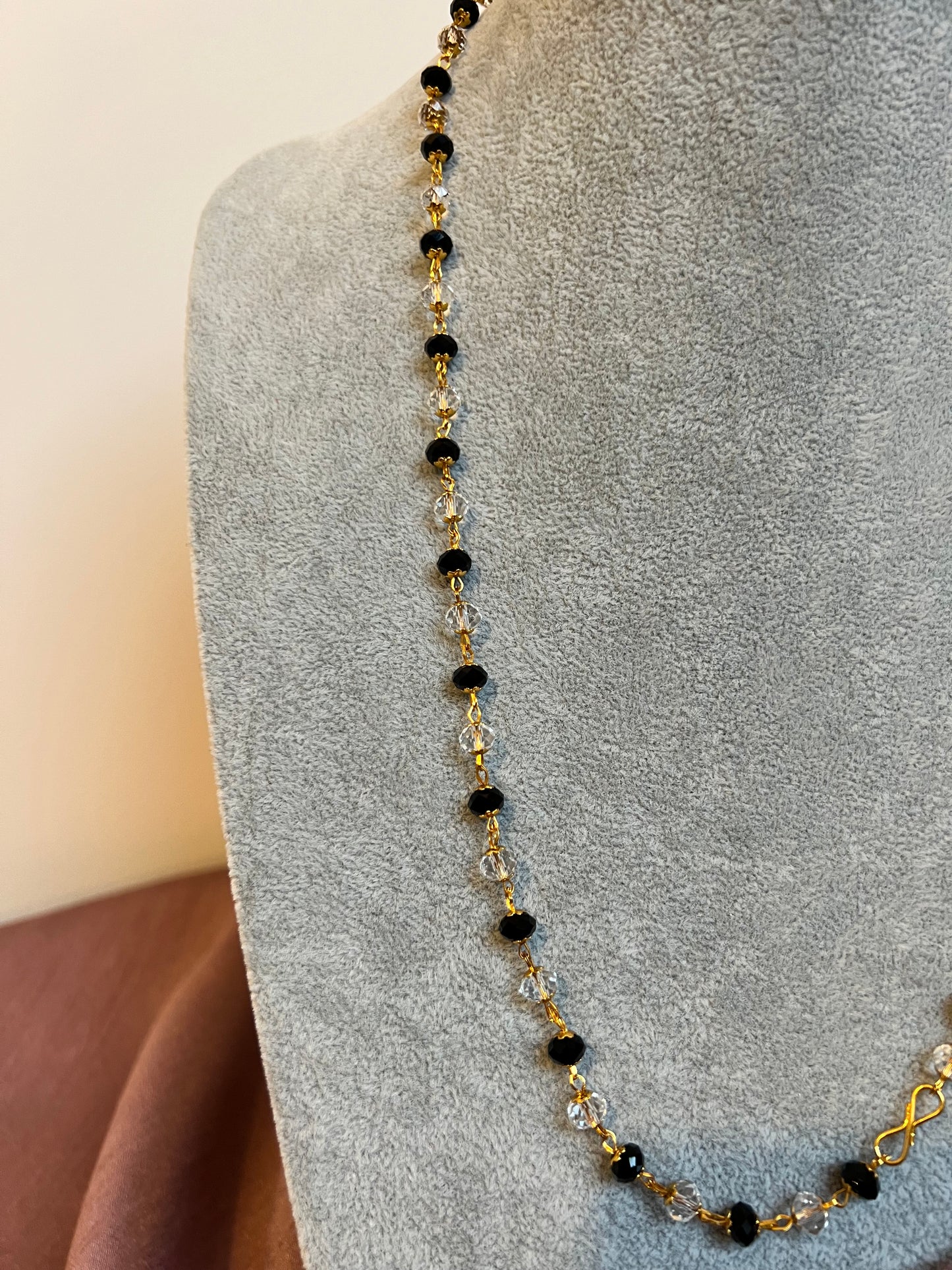 SUHANYA - Simple long black and clear beads golden necklace N3237