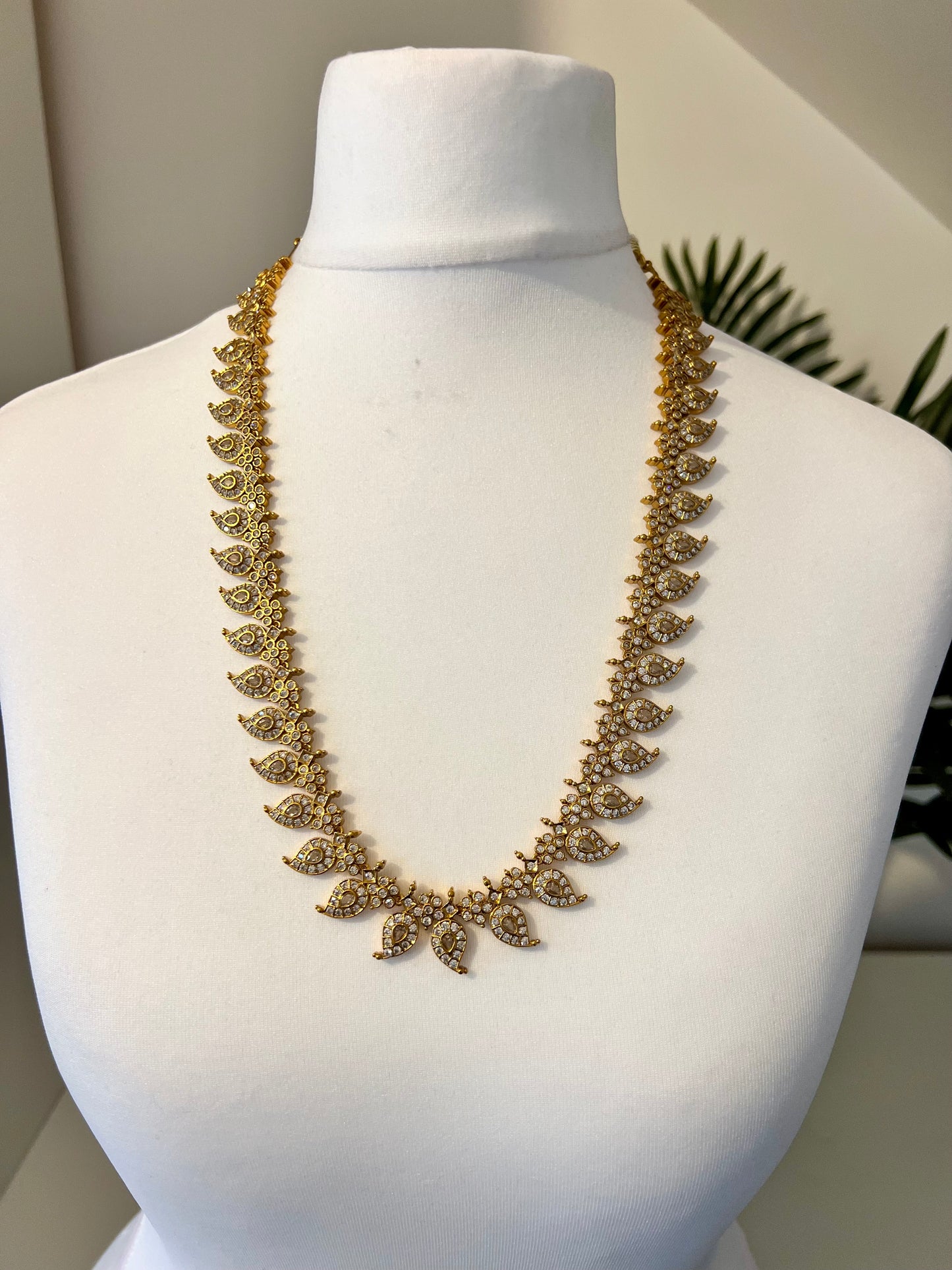 THUVIRA - Long golden haram mango motif with matching earrings N3173