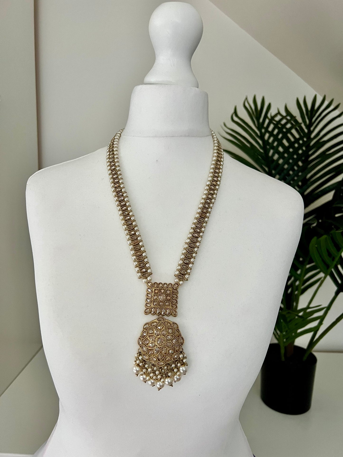 KAAVIYA - Antique mehndi plated long necklace set with pearls and a pair of earrings and tikka N3002