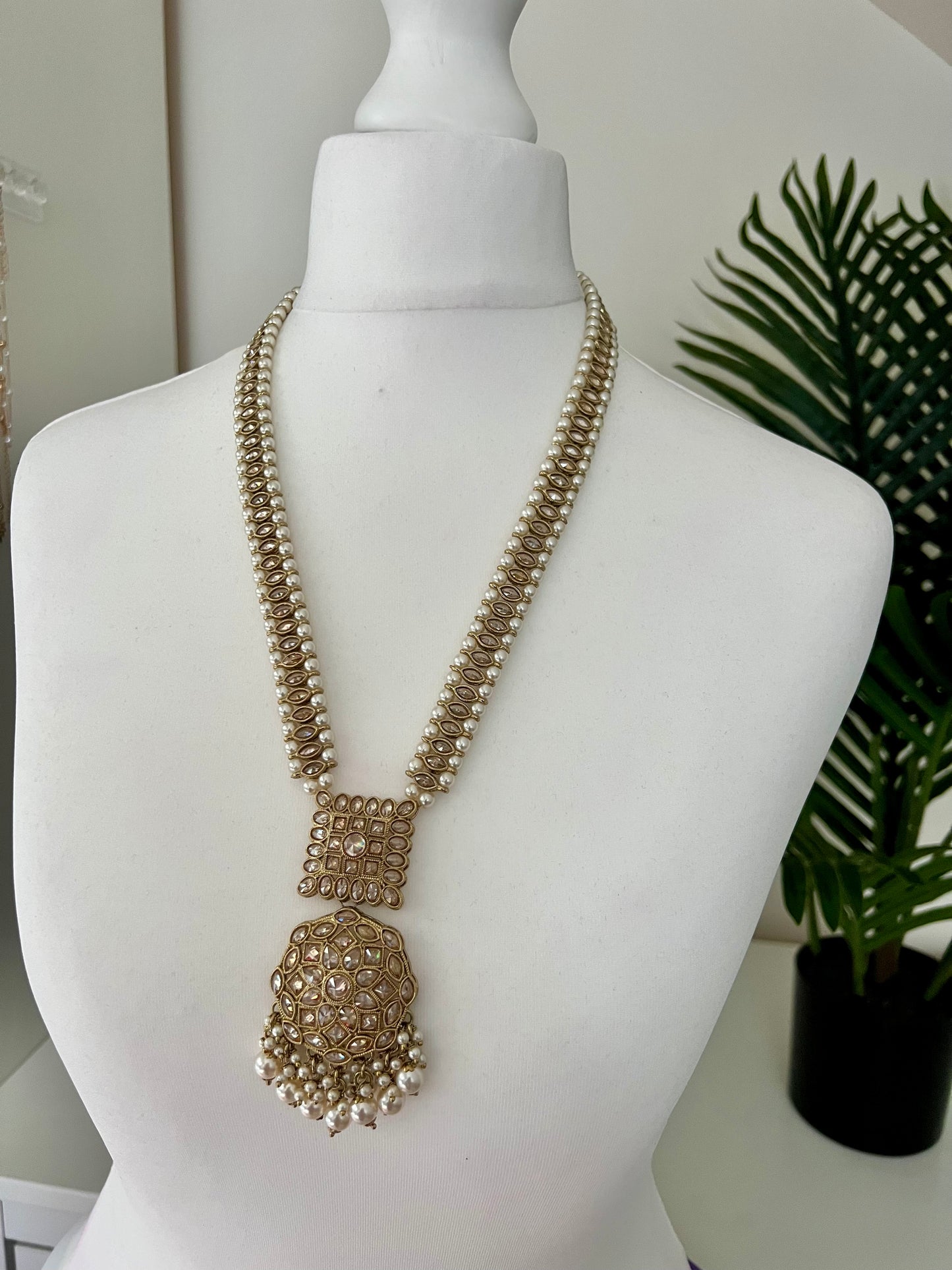 KAAVIYA - Antique mehndi plated long necklace set with pearls and a pair of earrings and tikka N3002