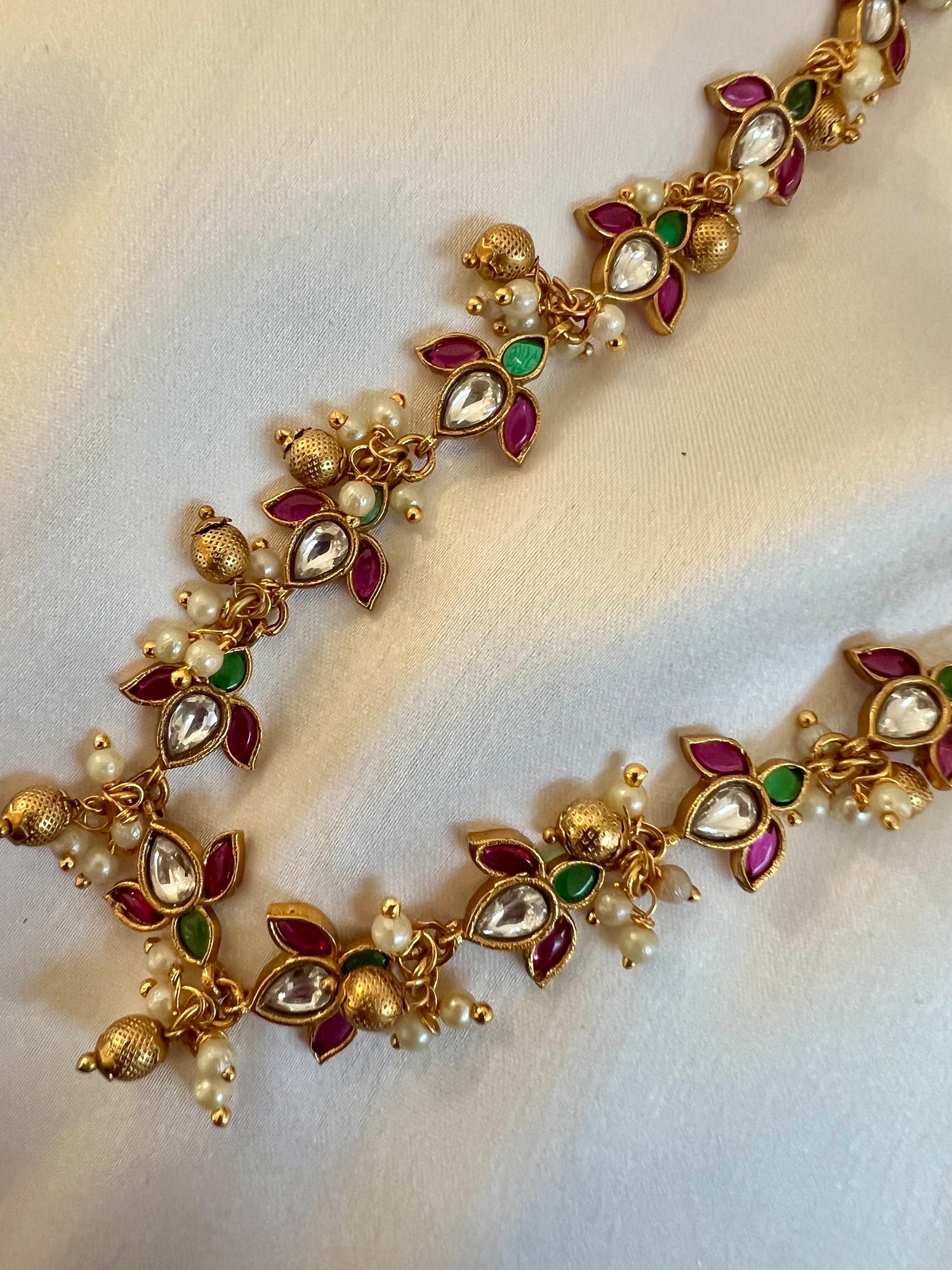 Lotus motif necklaces