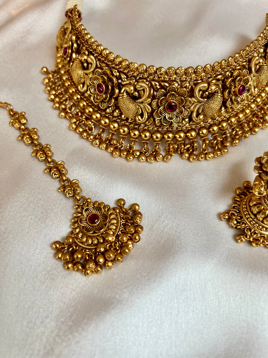 VINO- Antique high neck golden necklace with golden pearls and ruby stones, tikka and jhumkas N3181