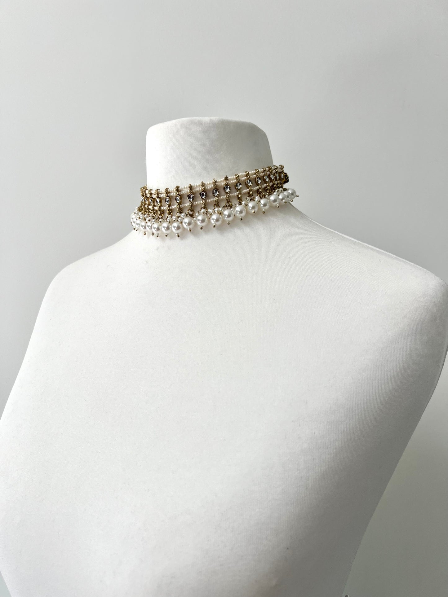SARELA - Mehndi plated white pearl stoned high band necklace with matching jhumkas and tikka N3294