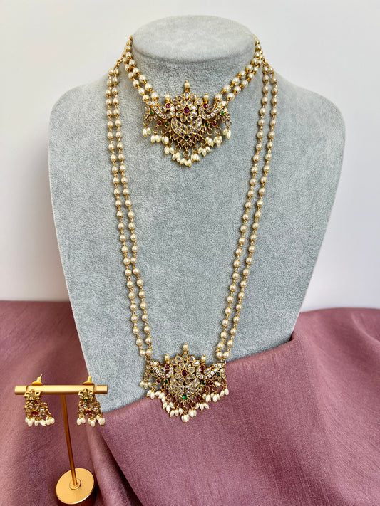 Beautiful short and long pearl necklace with a stunning clear stoned pendant,embellished with rice shaped pearls