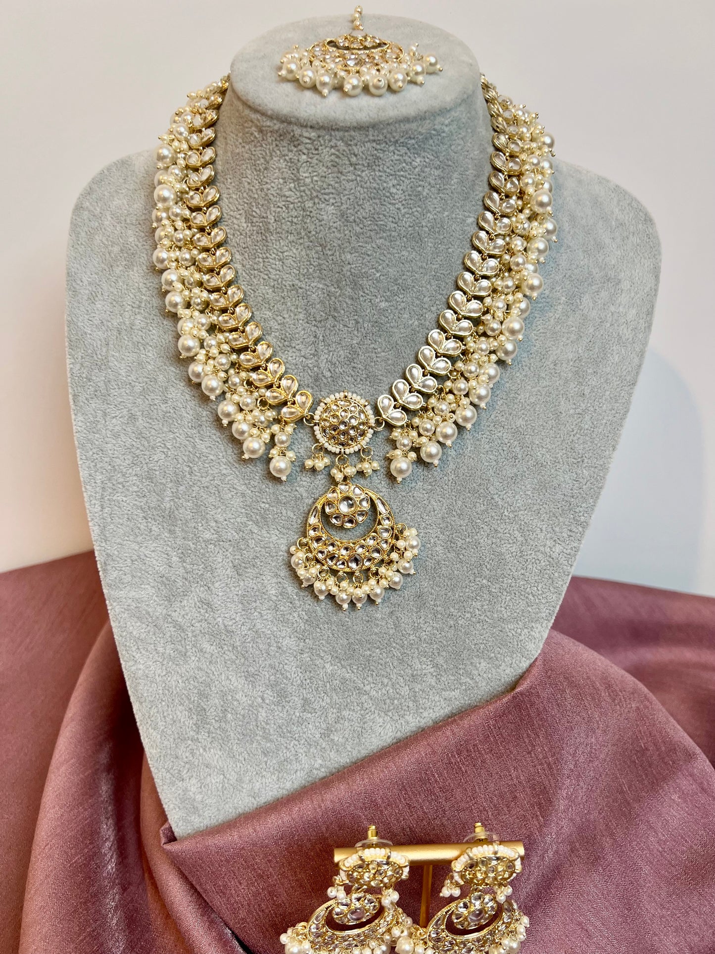 KANITHA- long pearl necklace with matching earrings and tikka