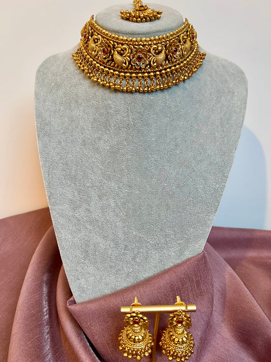 VINO- Antique high neck golden necklace with golden pearls and ruby stones, tikka and jhumkas N3181