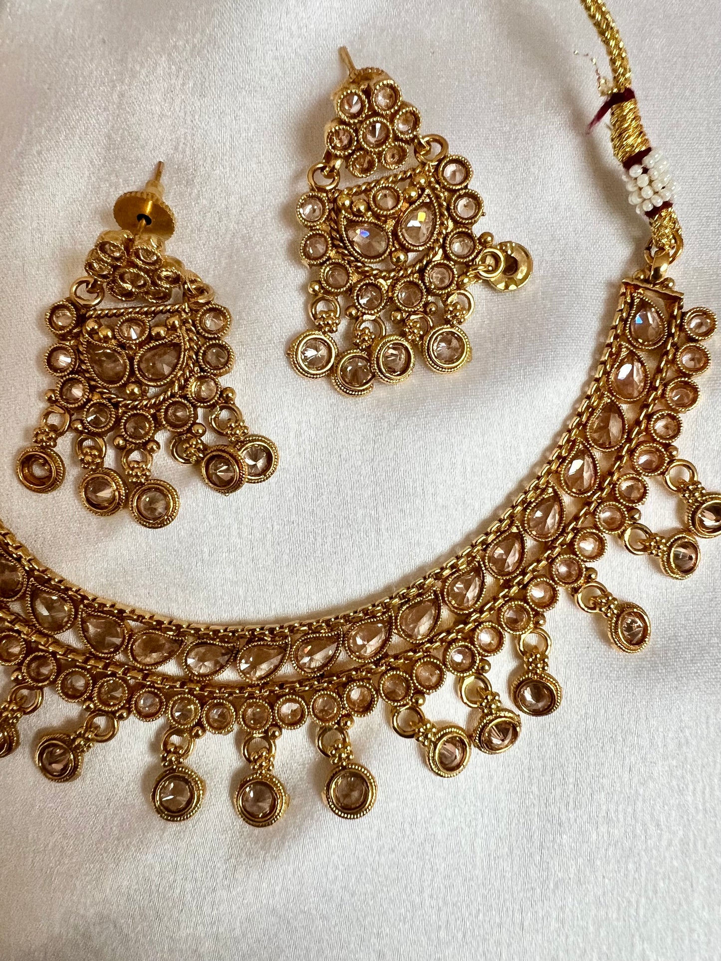 HEROSHA - Golden kundan stone short necklace with matching flat earrings N3203