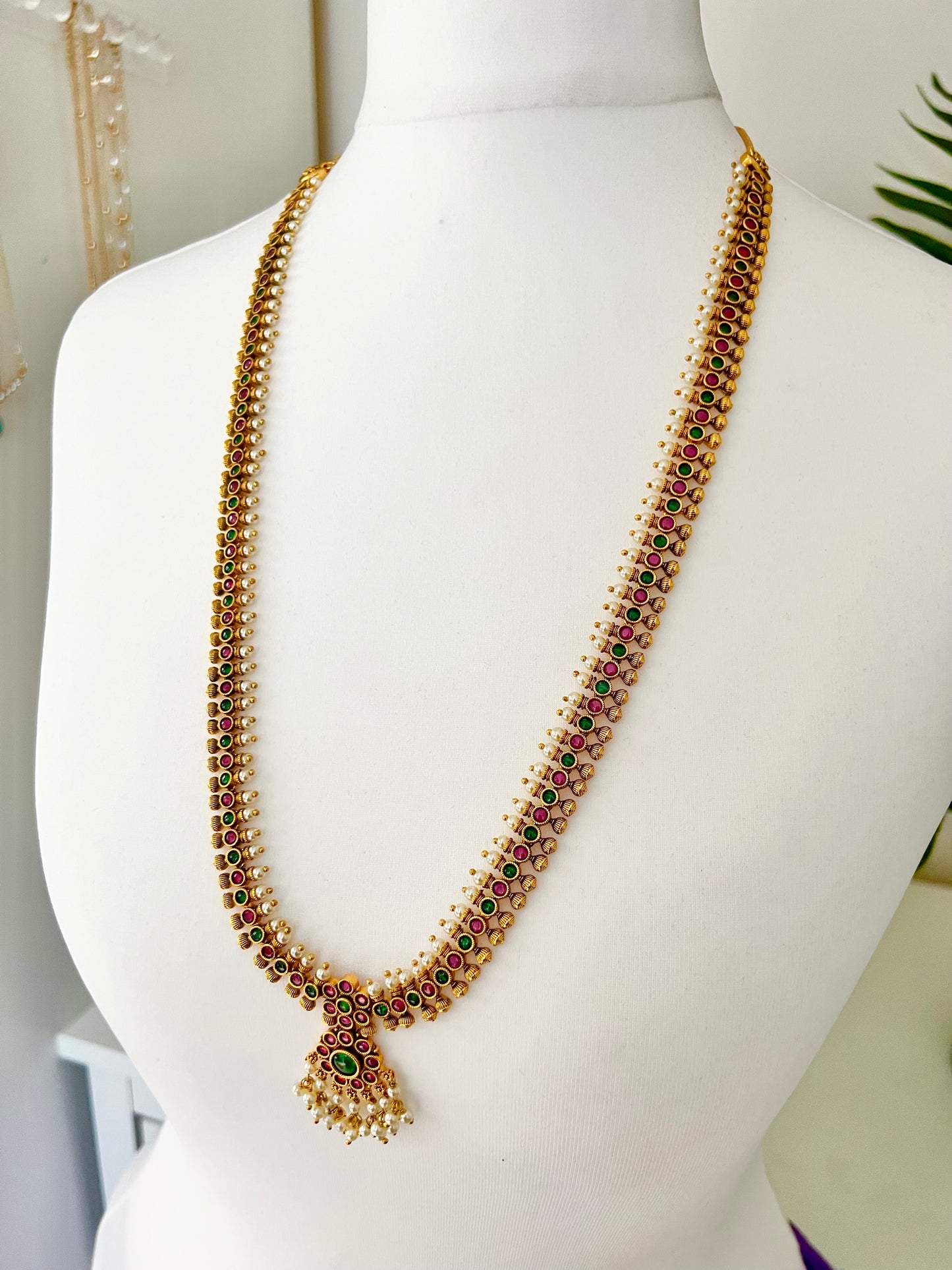 INIYA - Antique Kemp stone matte gold plated rubygreen South Indian long necklace set with a pair of earrings N3003