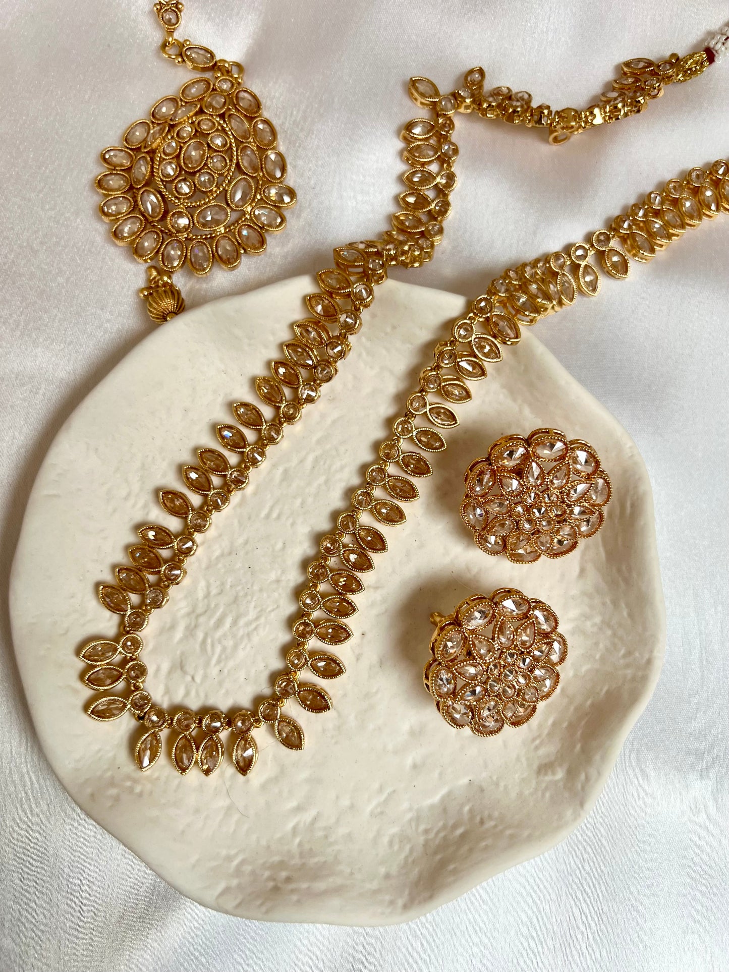 HASEENA - Long white stones golden necklace set with earrings and tikka N3202