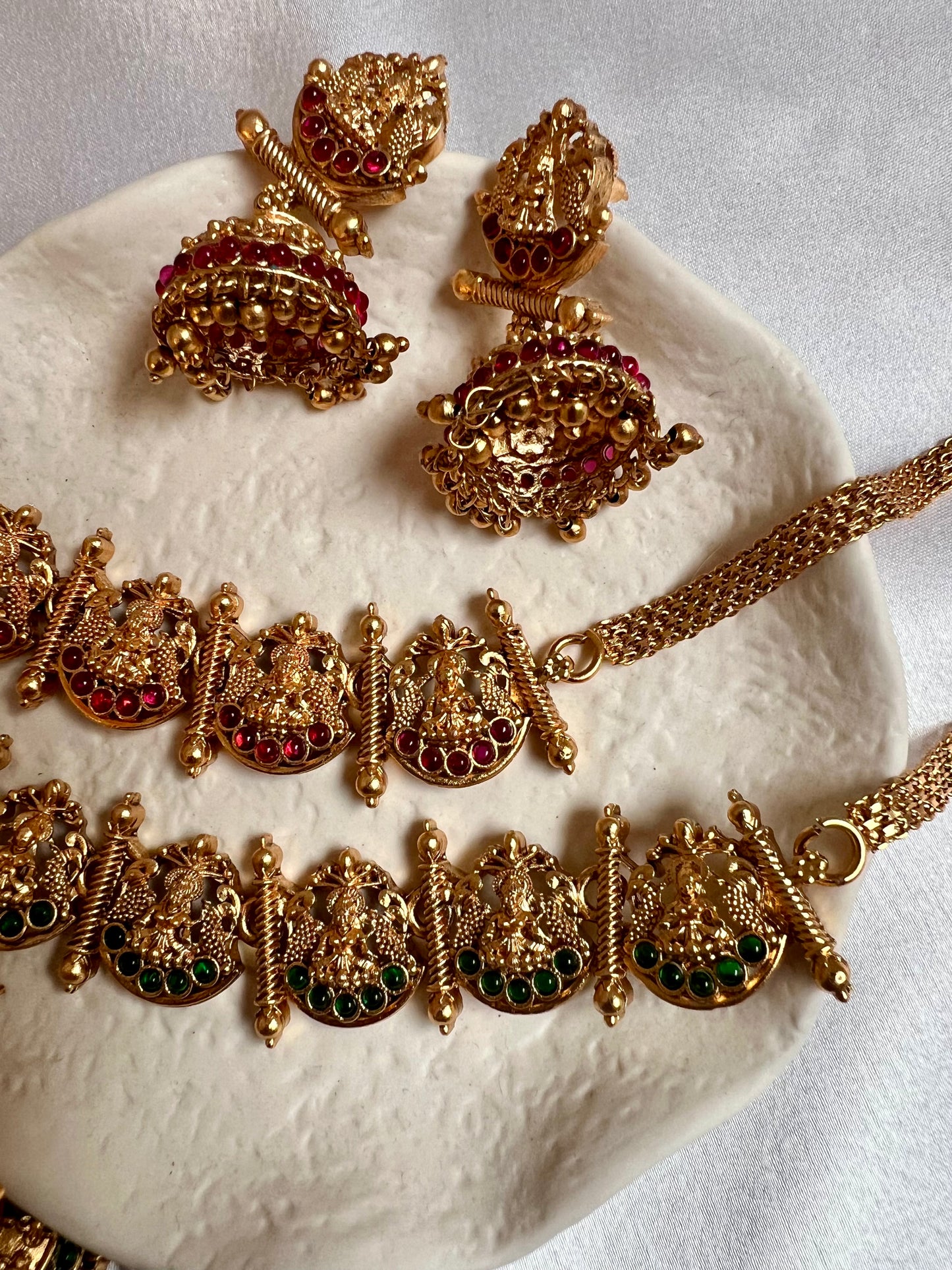 Antique temple matte gold short necklacce with matching jhumkas N3169